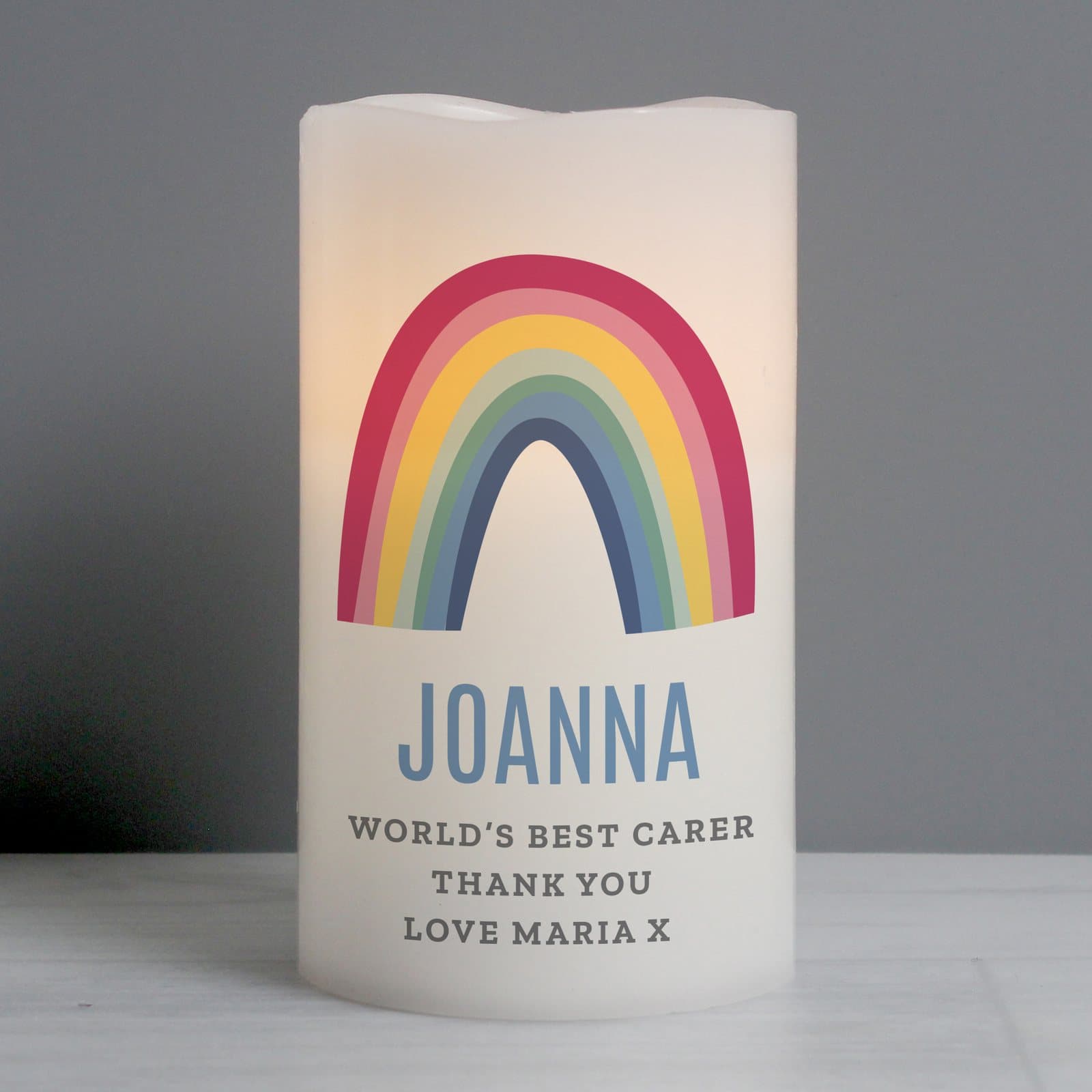 Personalised rainbow LED candle in an organza bag with name and message