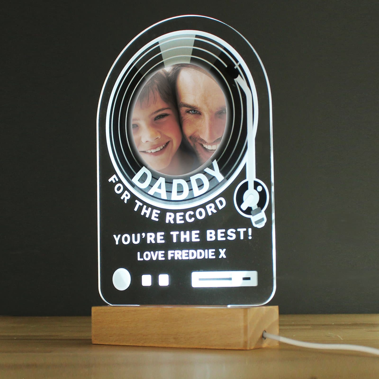 Record photo LED light on a wooden base with a photo, name and message