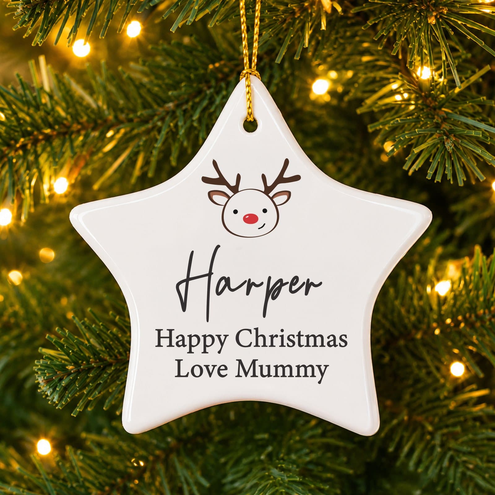 Reindeer ceramic star Christmas decoration with a ribbon