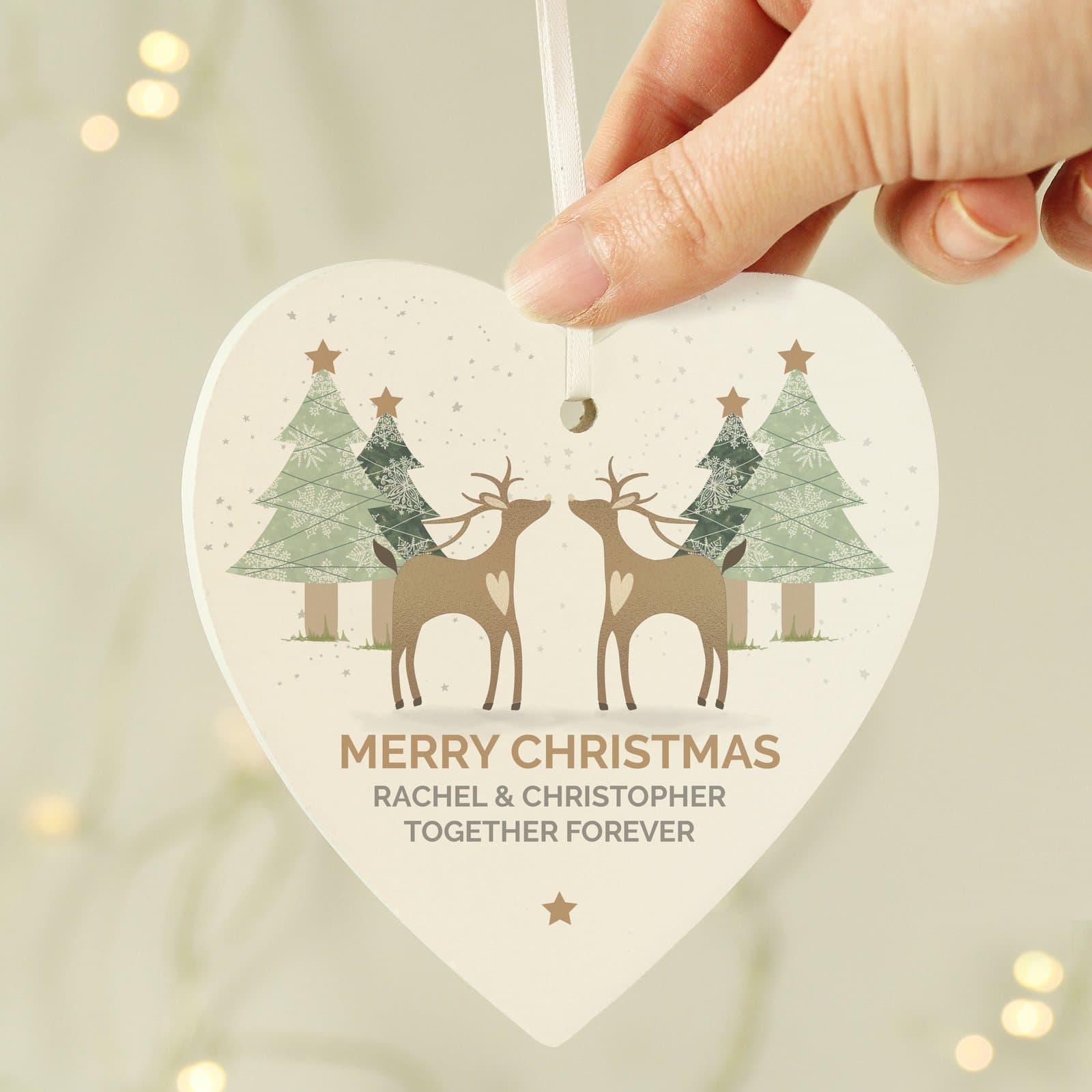 Wooden heart Christmas decoration with a reindeer couple