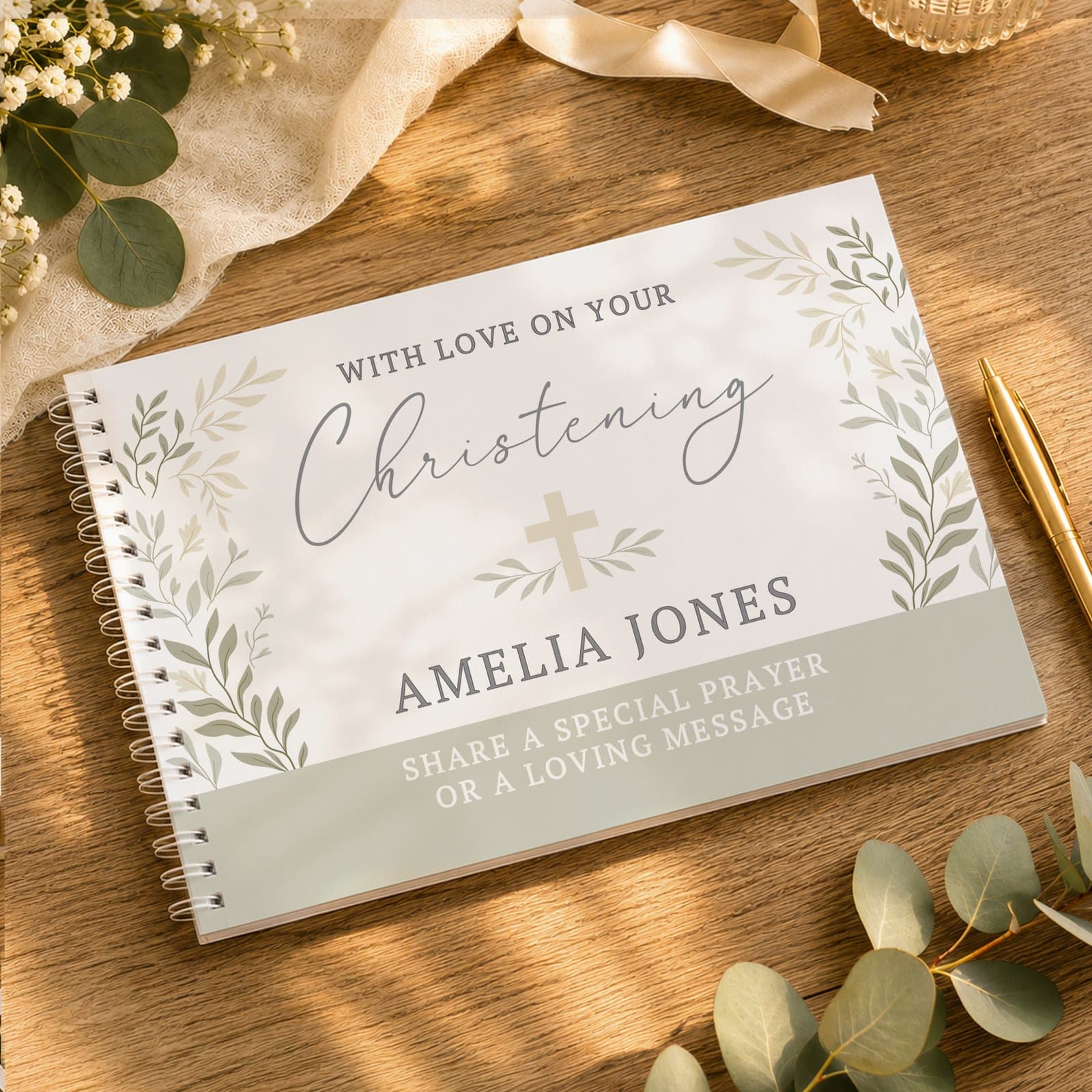 Spiral bound guest book with a religious cross design and personalised cover text