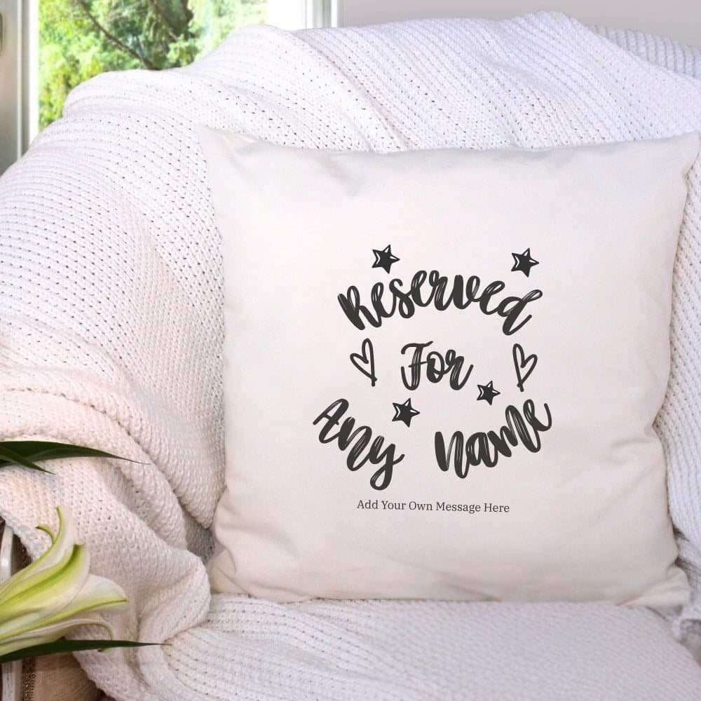 Cream personalised cushion with 'Reserved for' wording and stars and hearts