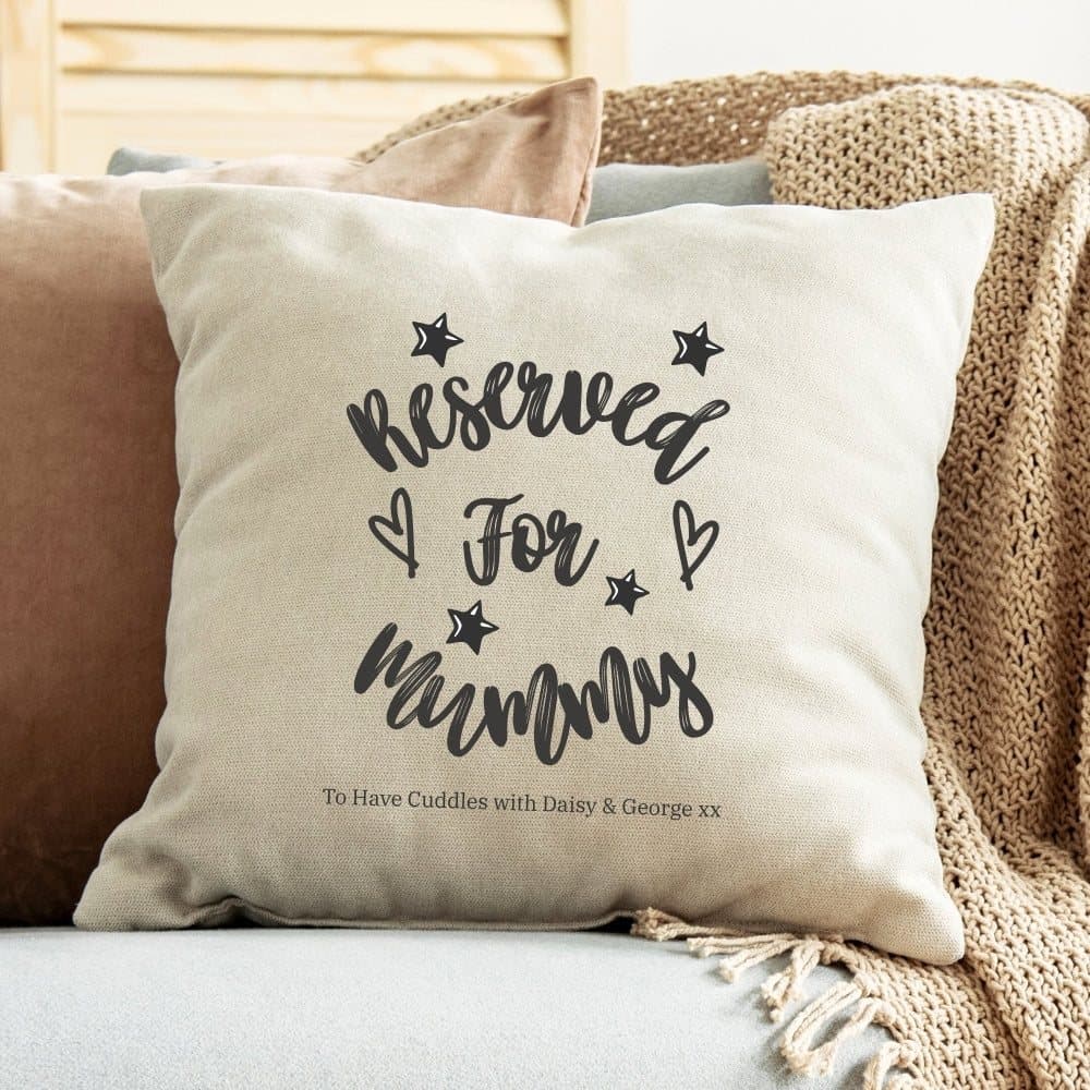 Cream square cushion with Reserved for Mummy, stars and hearts