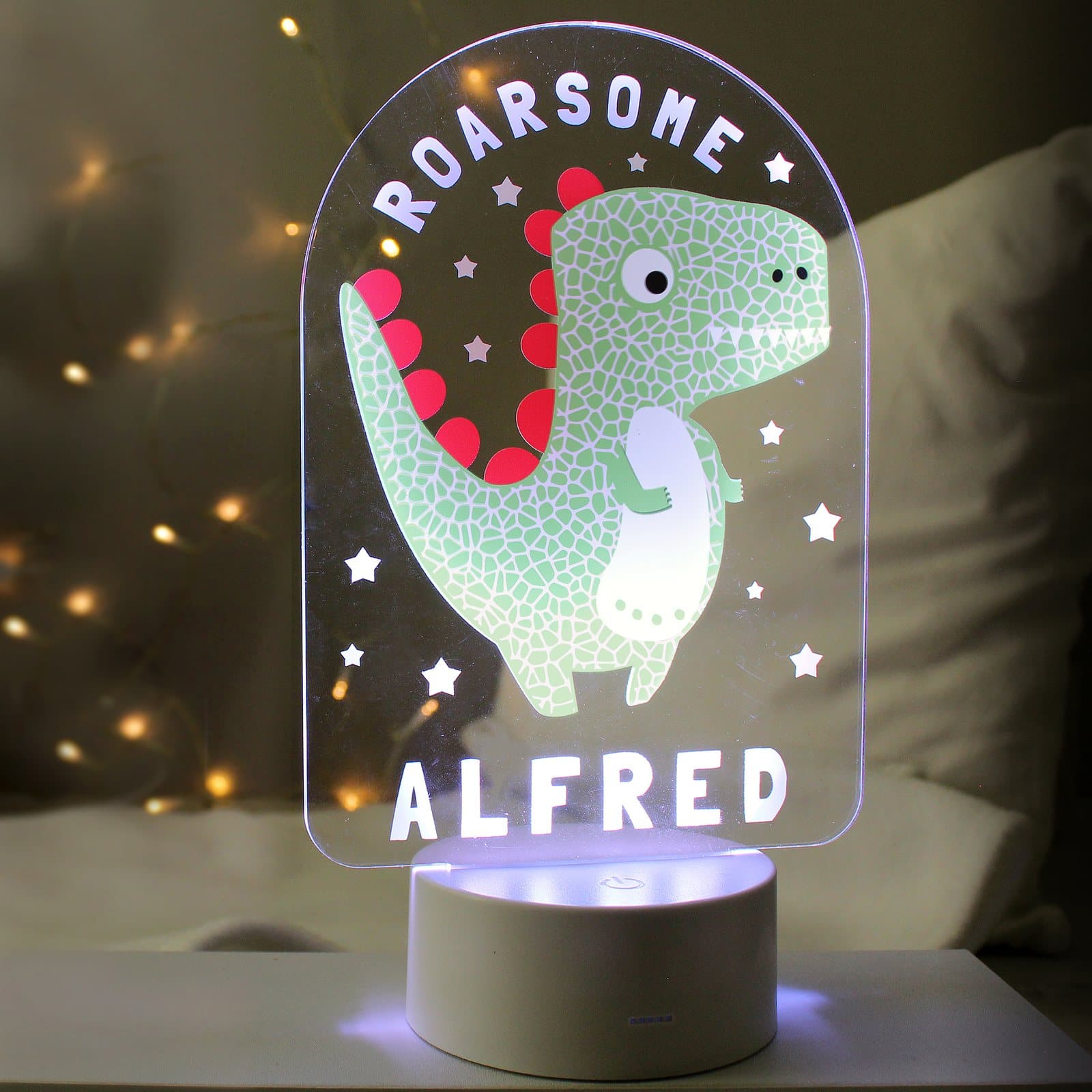 Dinosaur LED night light with an acrylic sign showing a child's name