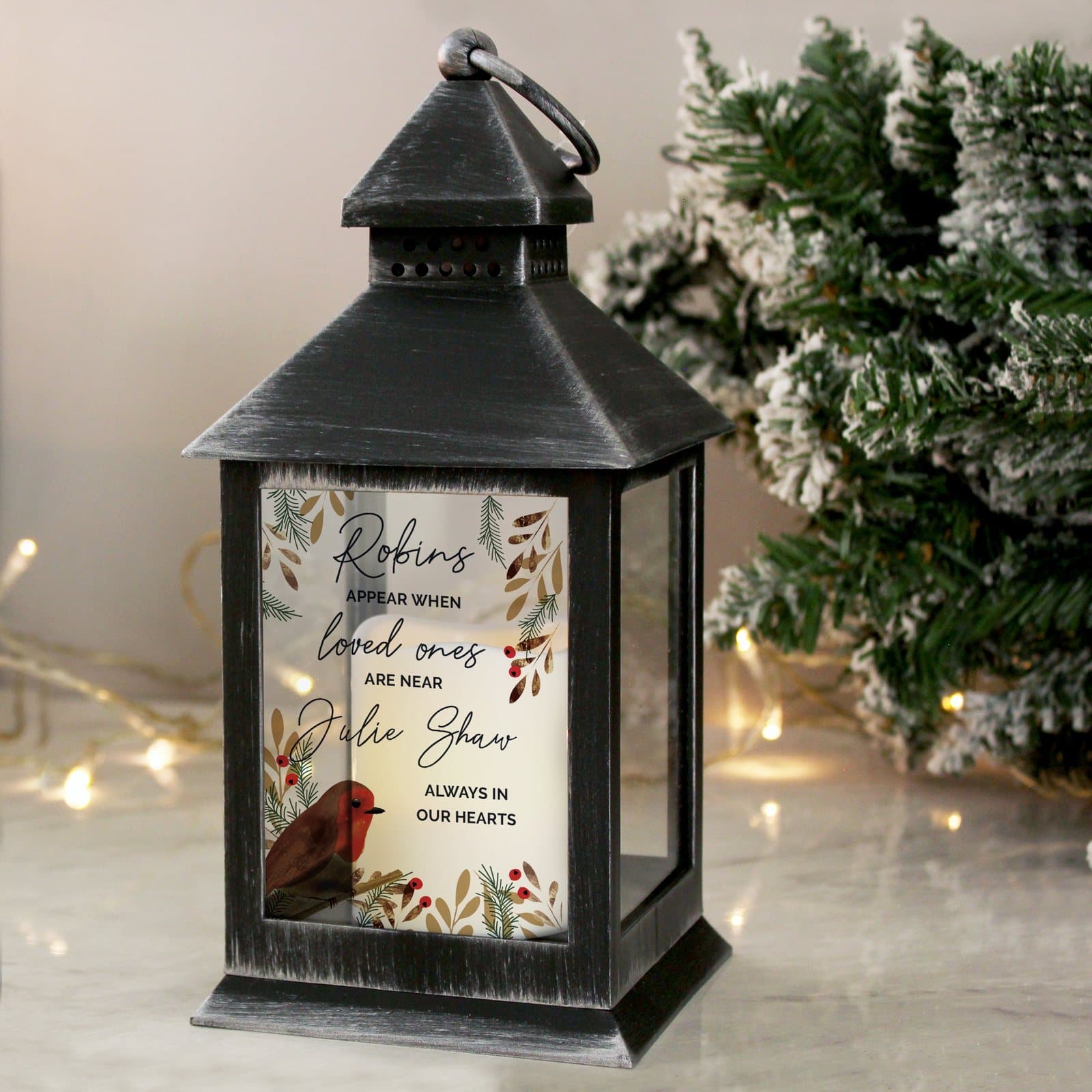 Black memorial lantern with a flickering flame effect and robin text