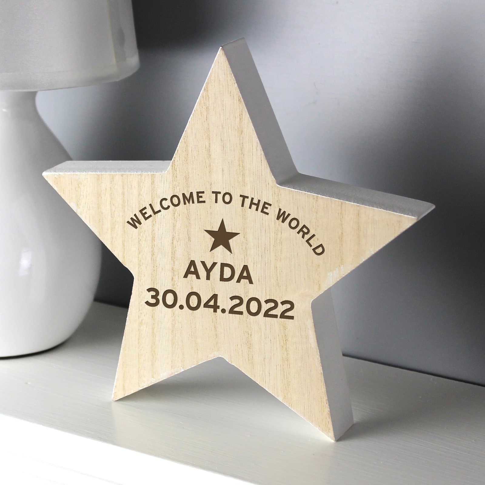 Rustic wooden star decoration with personalised text