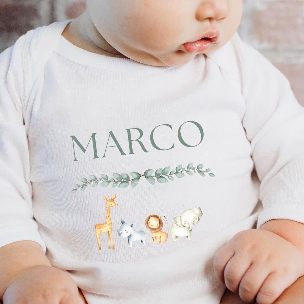Personalised safari animals baby grow, vest or bib with a name in the design