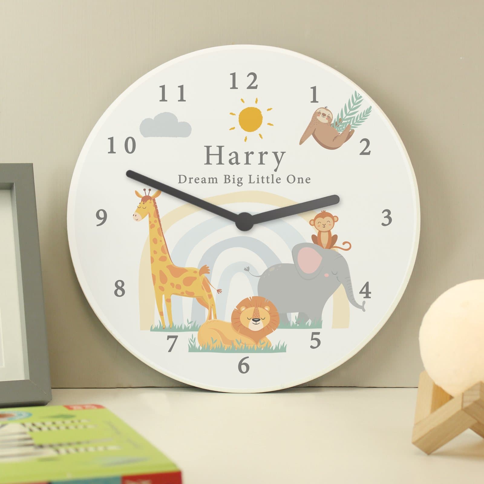 Wooden nursery clock with a safari animals design and personalised text