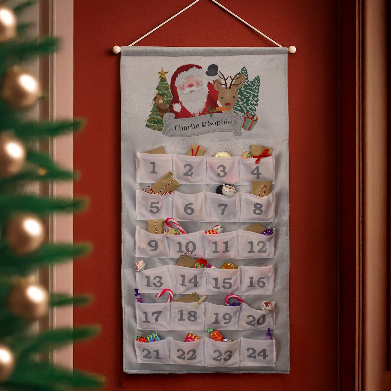 Silver grey Pocket Santa advent calendar with numbered pockets and a personalised message