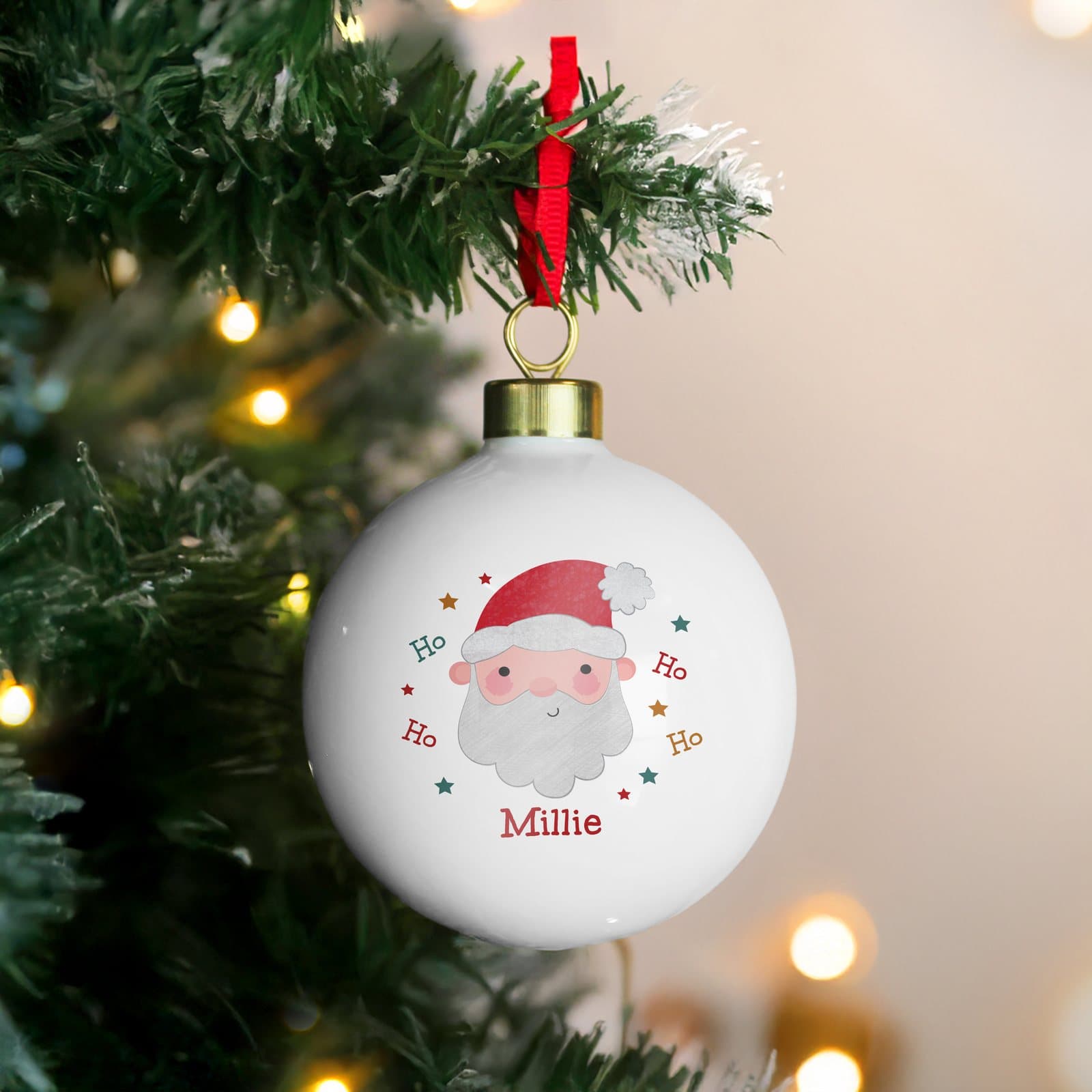 Santa Christmas bauble with a name on the front and a hanging ribbon