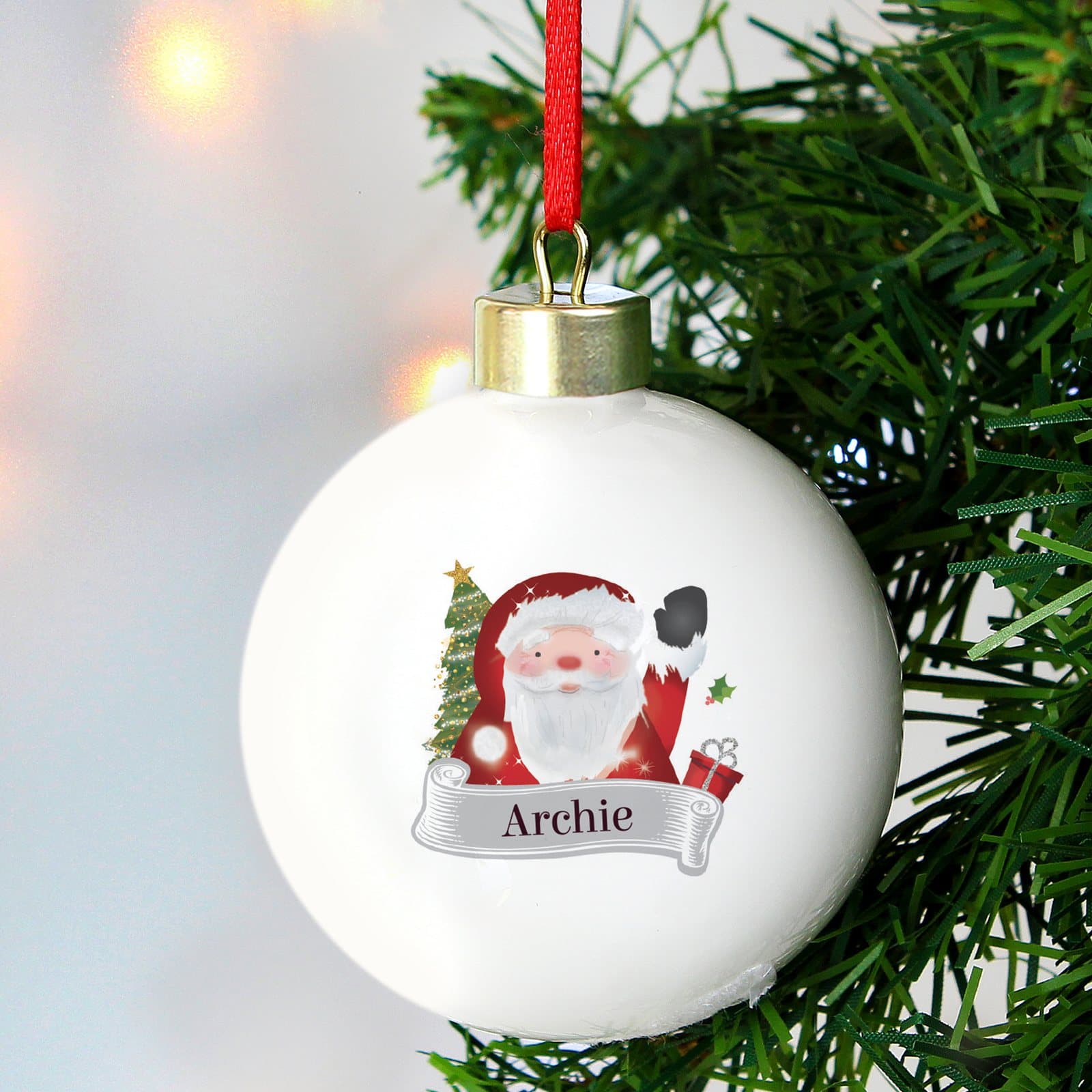 Santa Claus Christmas bauble with a name on the front and a ribbon