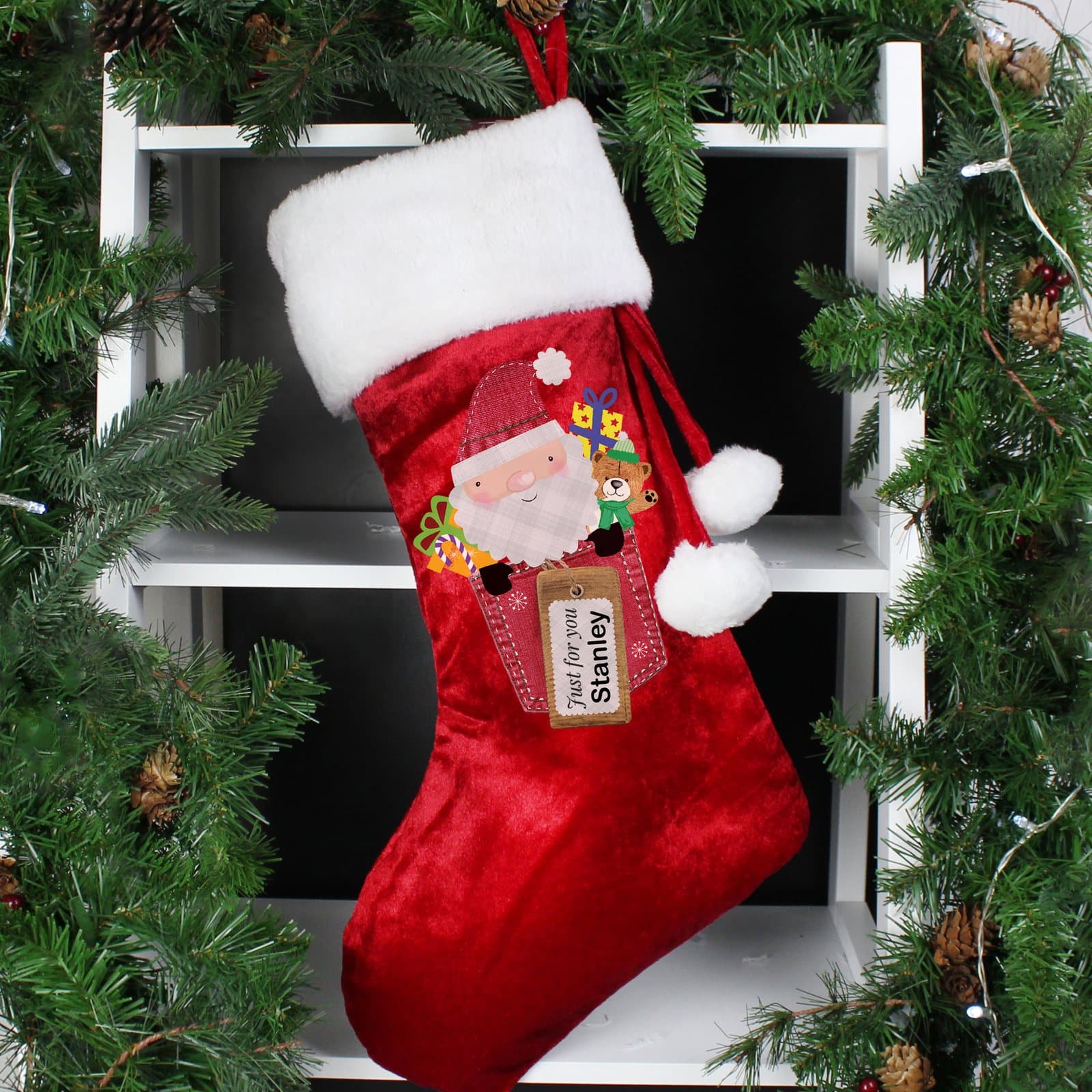 Red Santa Claus Christmas stocking with a name and 'just for you' text
