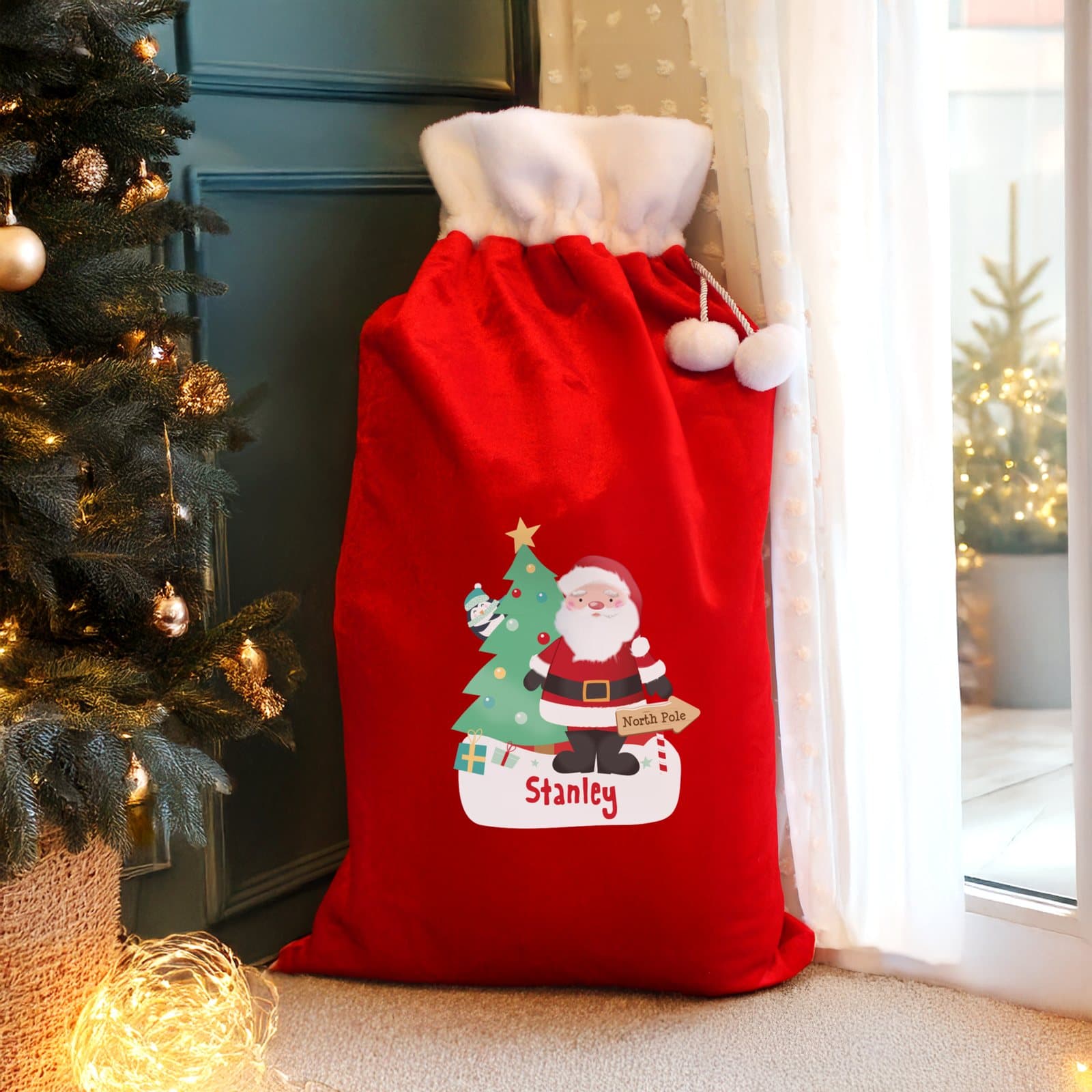 Red fleece Santa sack with pom pom design