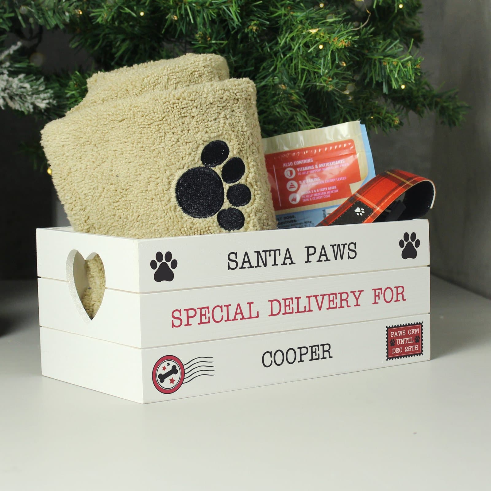 White wooden Santa Paws crate with heart shaped handles