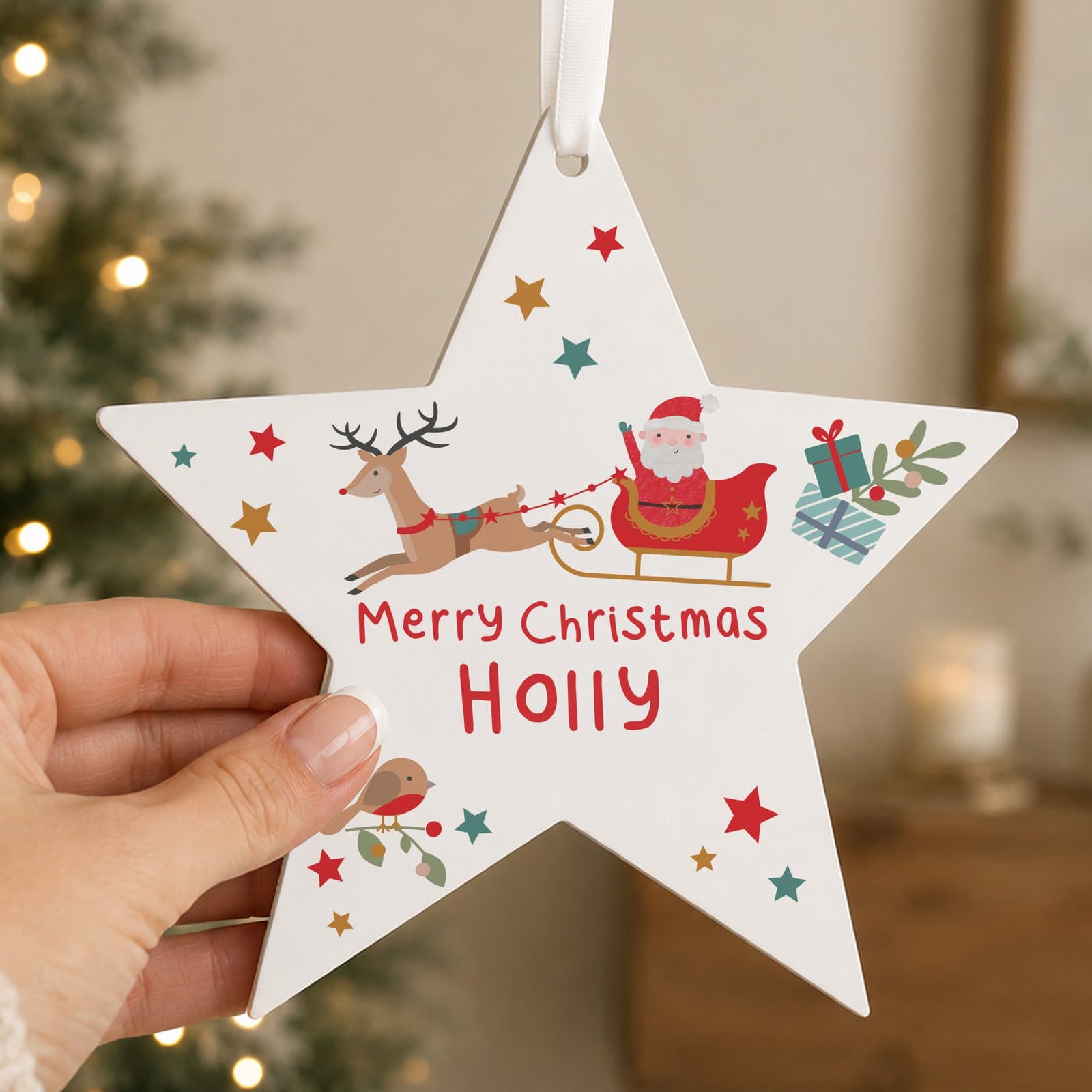 Wooden star decoration with Santa and reindeer cartoon design and ribbon
