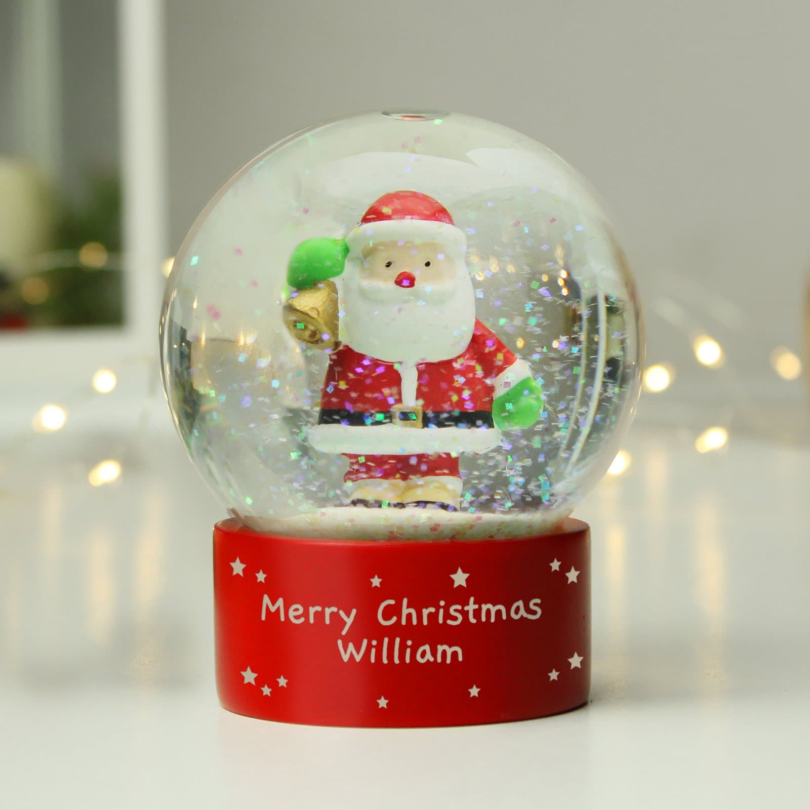 Santa snow globe ornament filled with glitter
