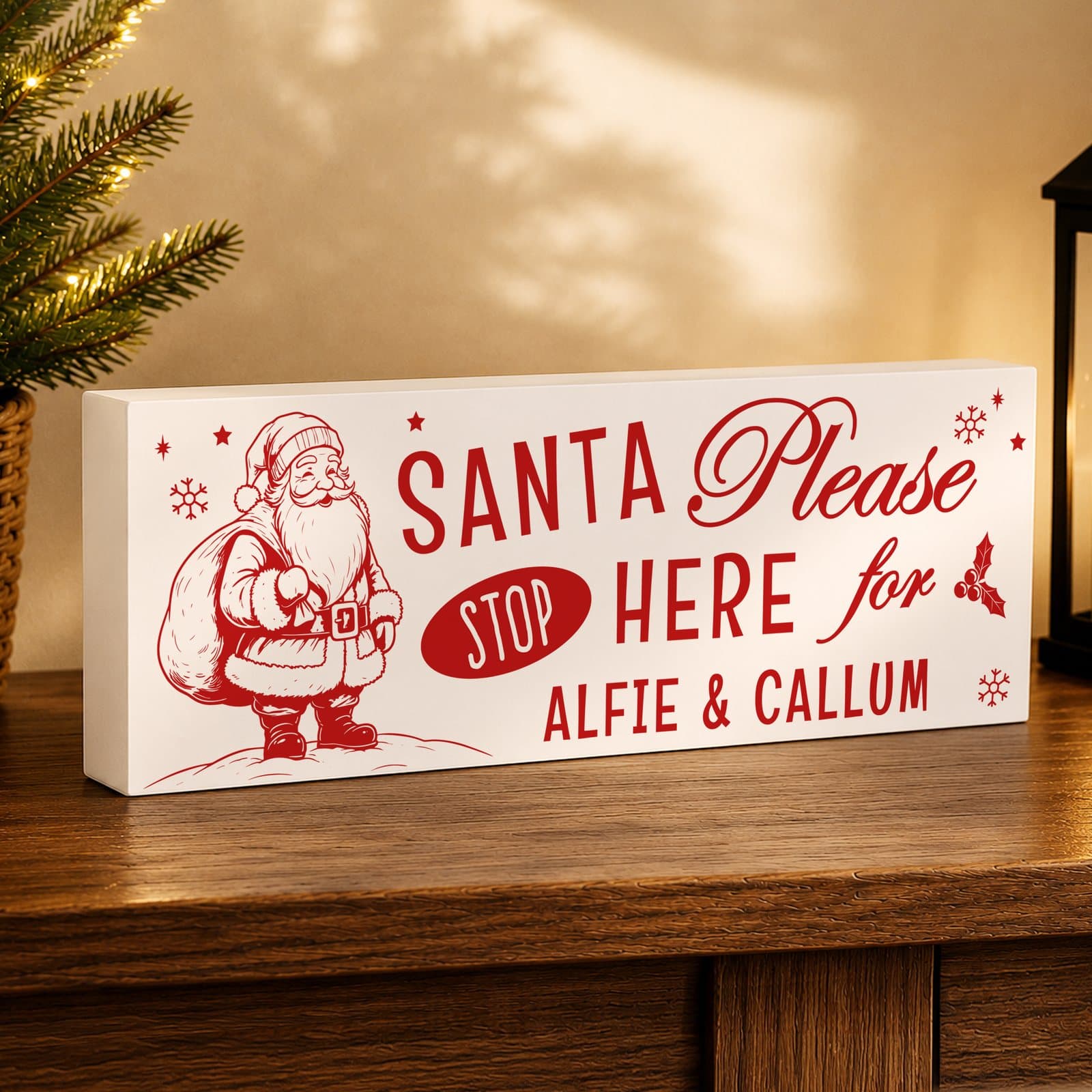 Wooden Santa stop here mantle block with a personalised line of text