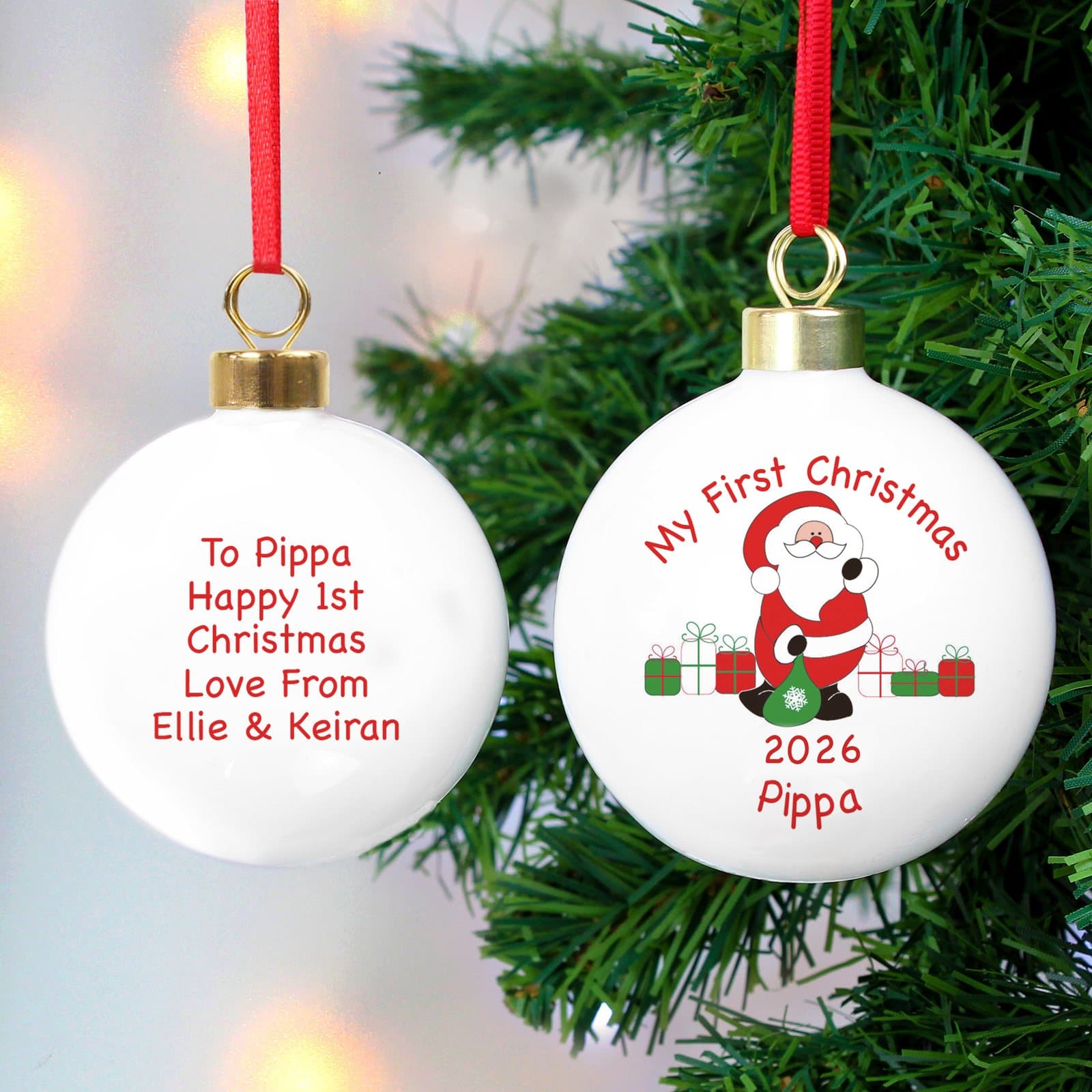 Father Christmas bauble with presents and 'My First Christmas' on the front