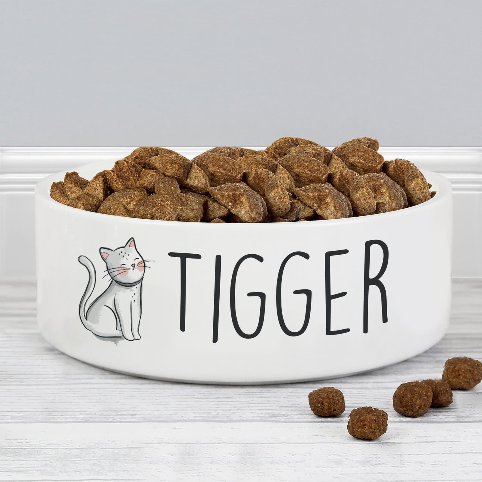 Ceramic pet bowl with a scribble cat design and a pet's name