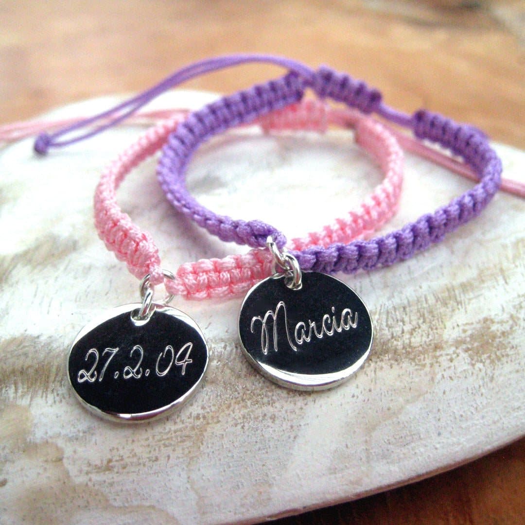 Personalised script friendship bracelet with a silver engraved disc on braided nylon cord