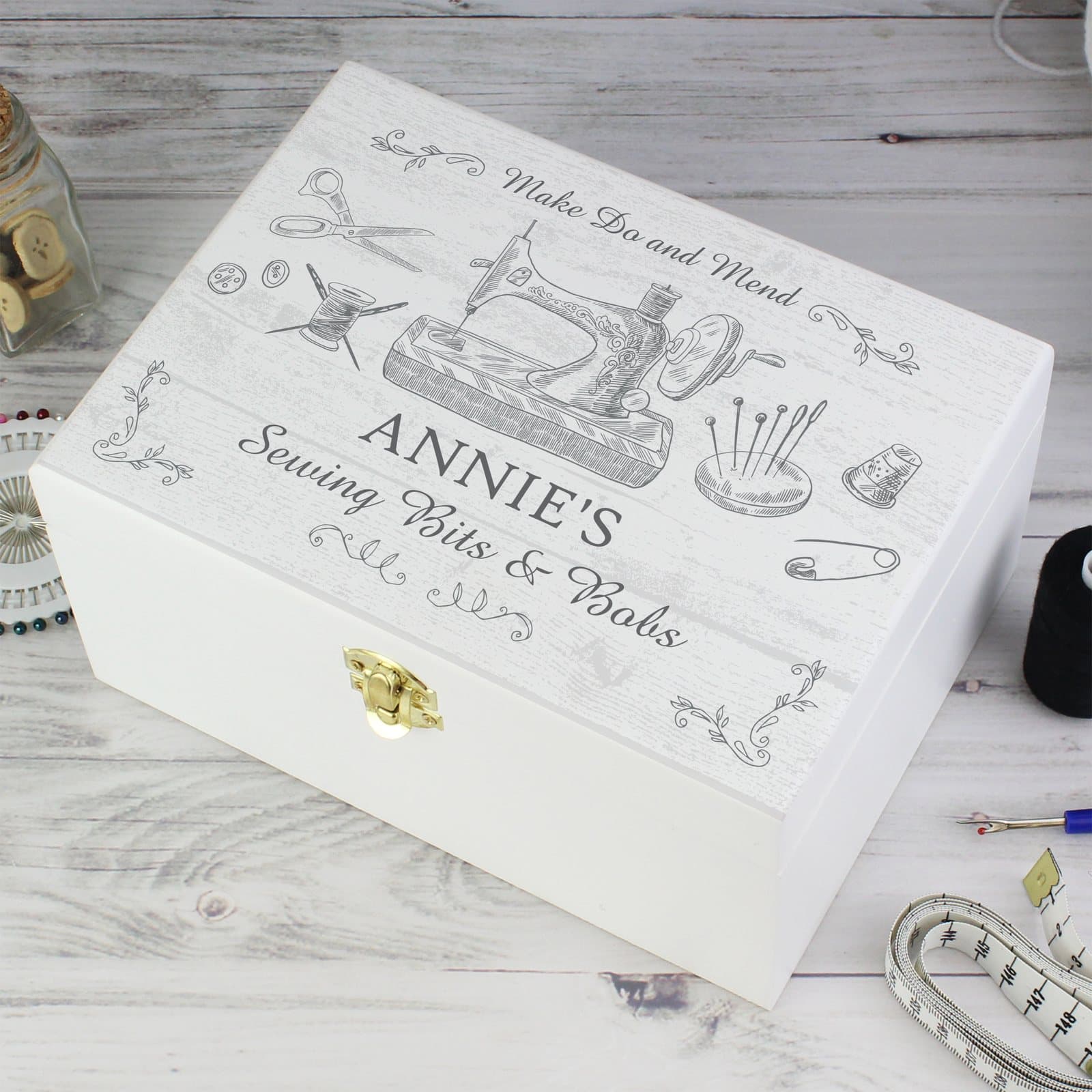 White hand painted wooden sewing kit keepsake box with a metal clasp
