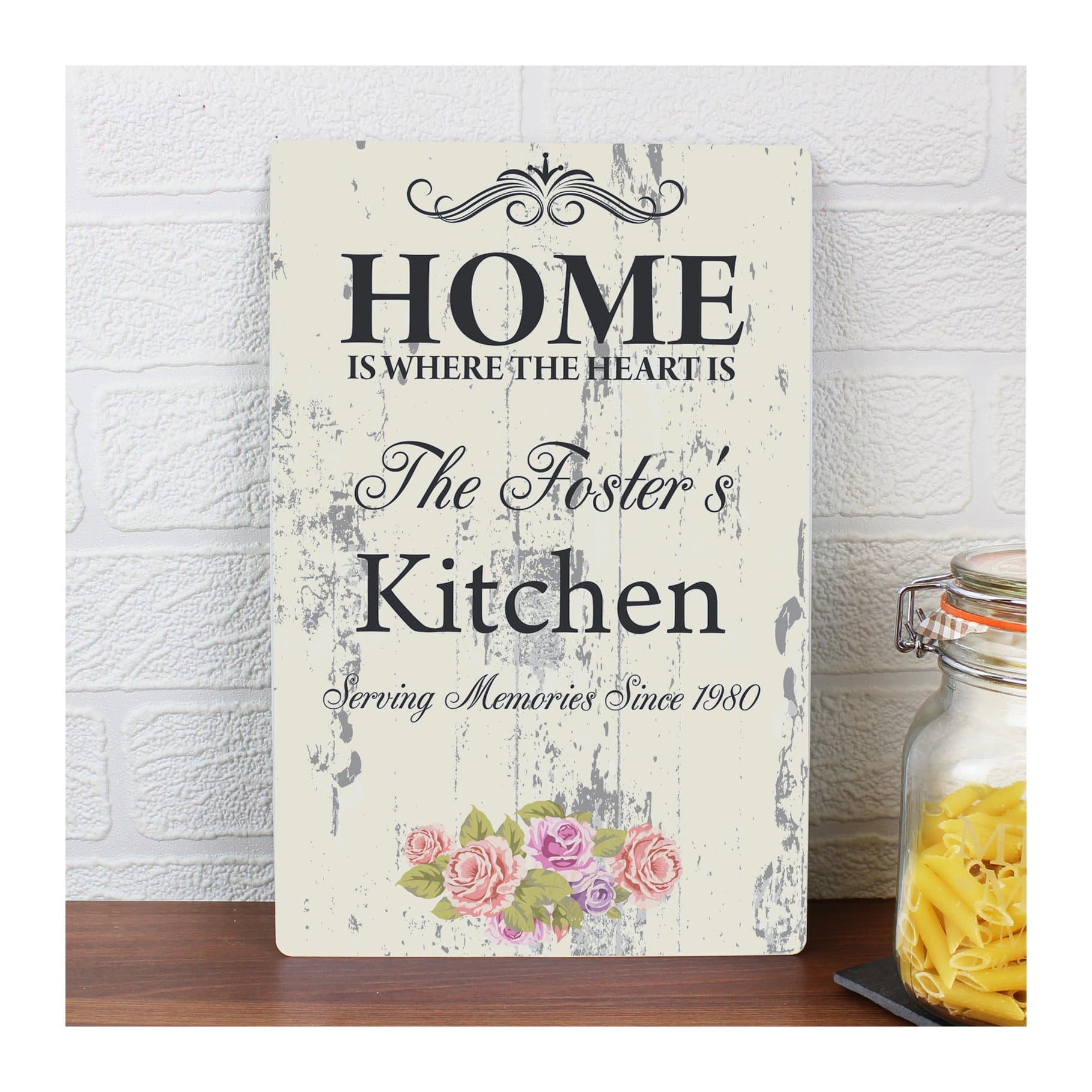 Shabby chic aluminium plaque reading Home Is Where The Heart Is with personalised lines