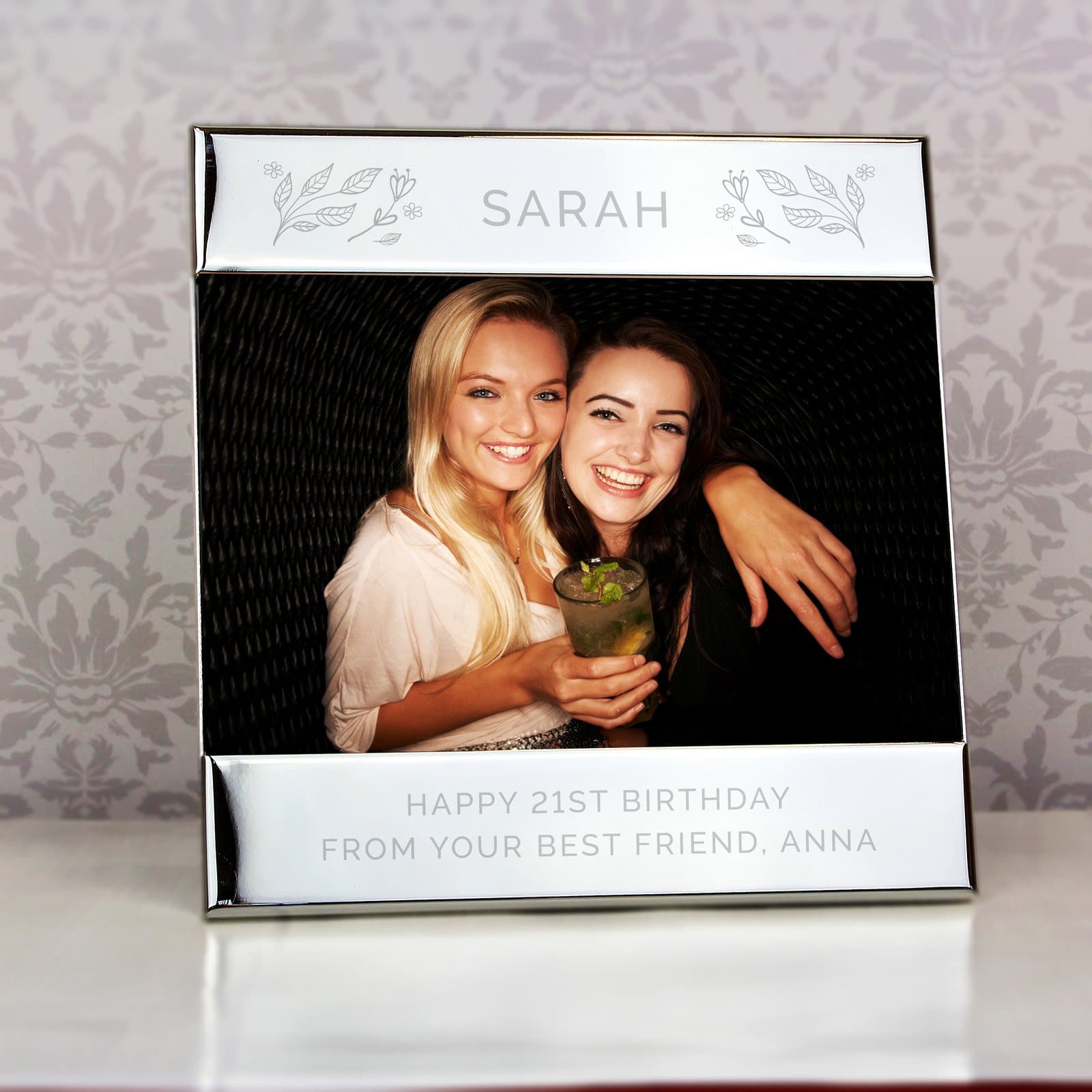 Silver floral landscape photo frame with a top text line and two lines below