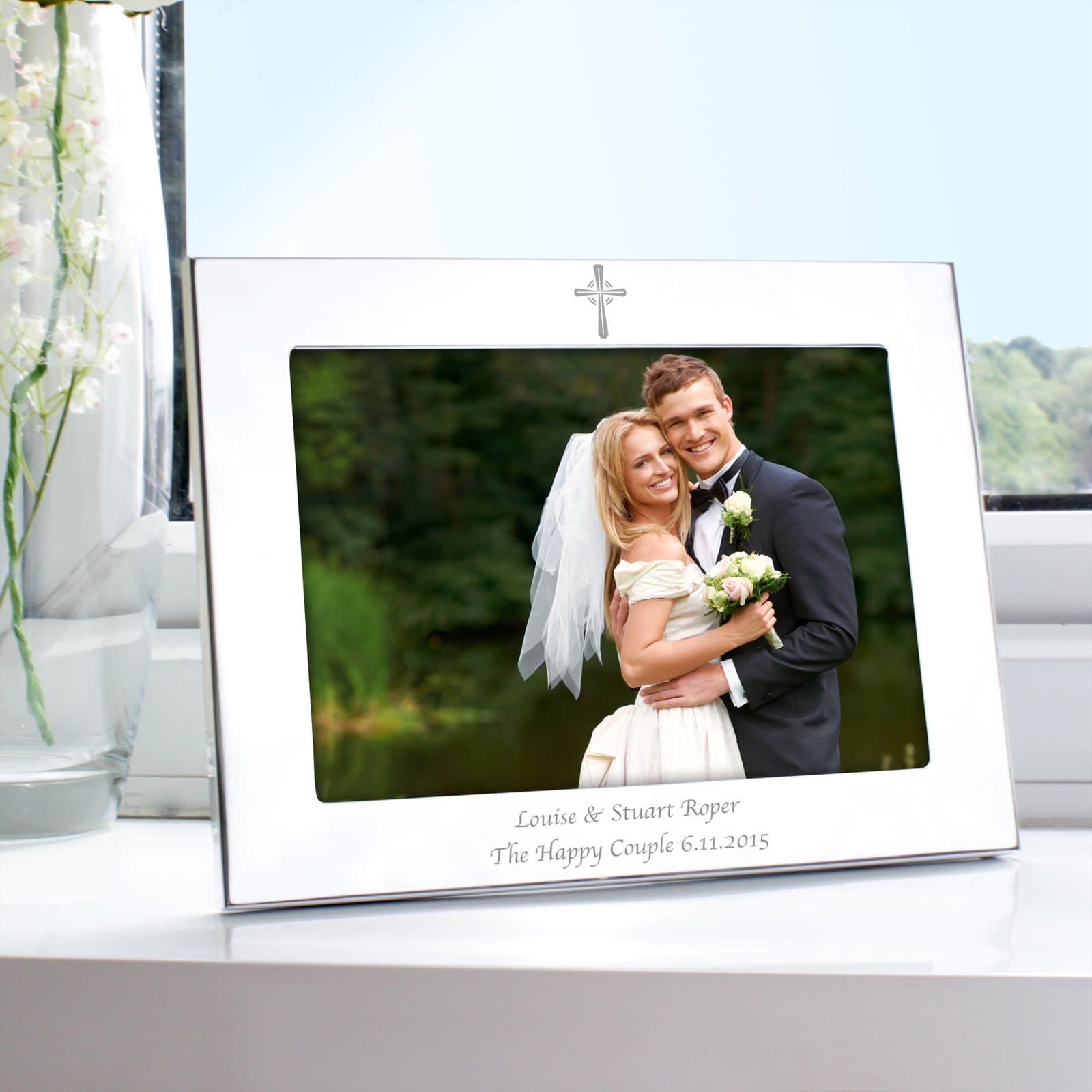 Silver landscape photo frame with a cross motif and personalised message