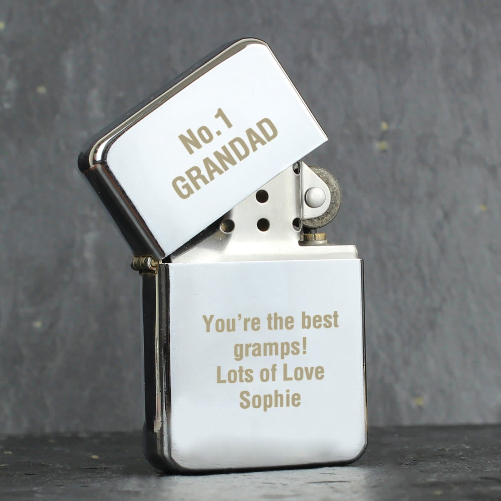 Personalised silver oil lighter with message lines on the lid and body