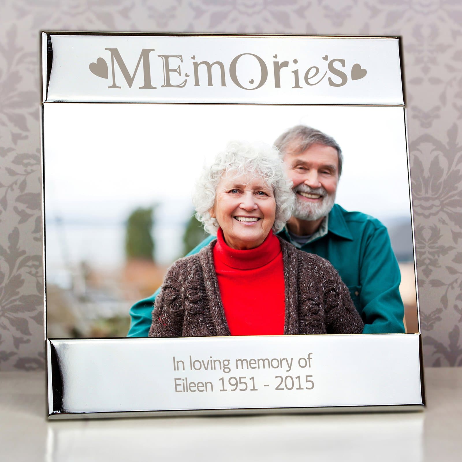Square silver photo frame with the word Memories and a message at the bottom