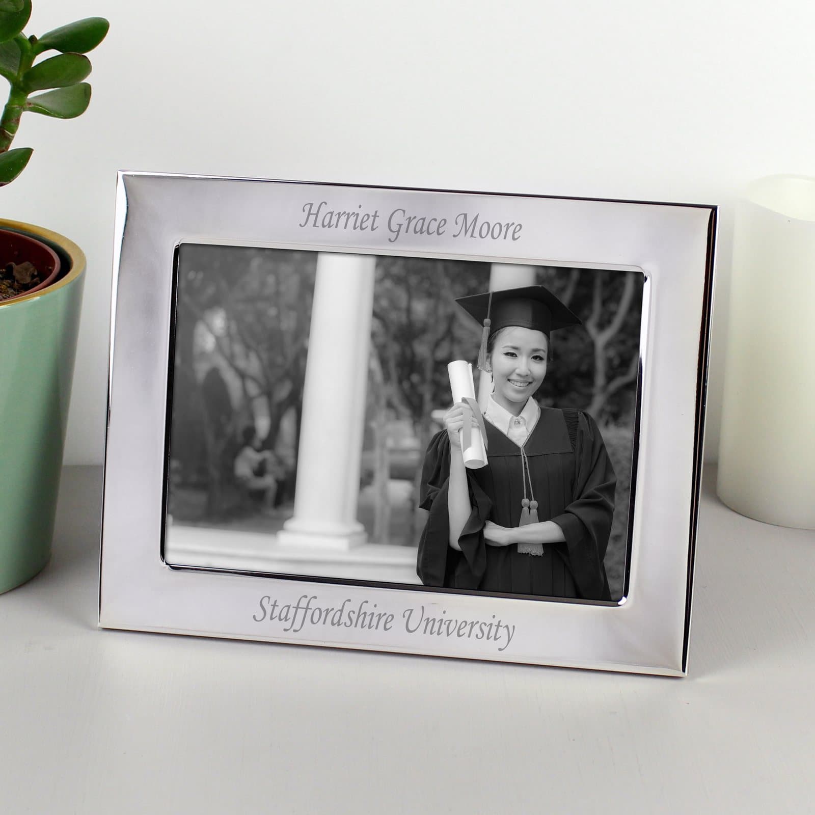 Silver plated landscape photo frame with text above and below the photo