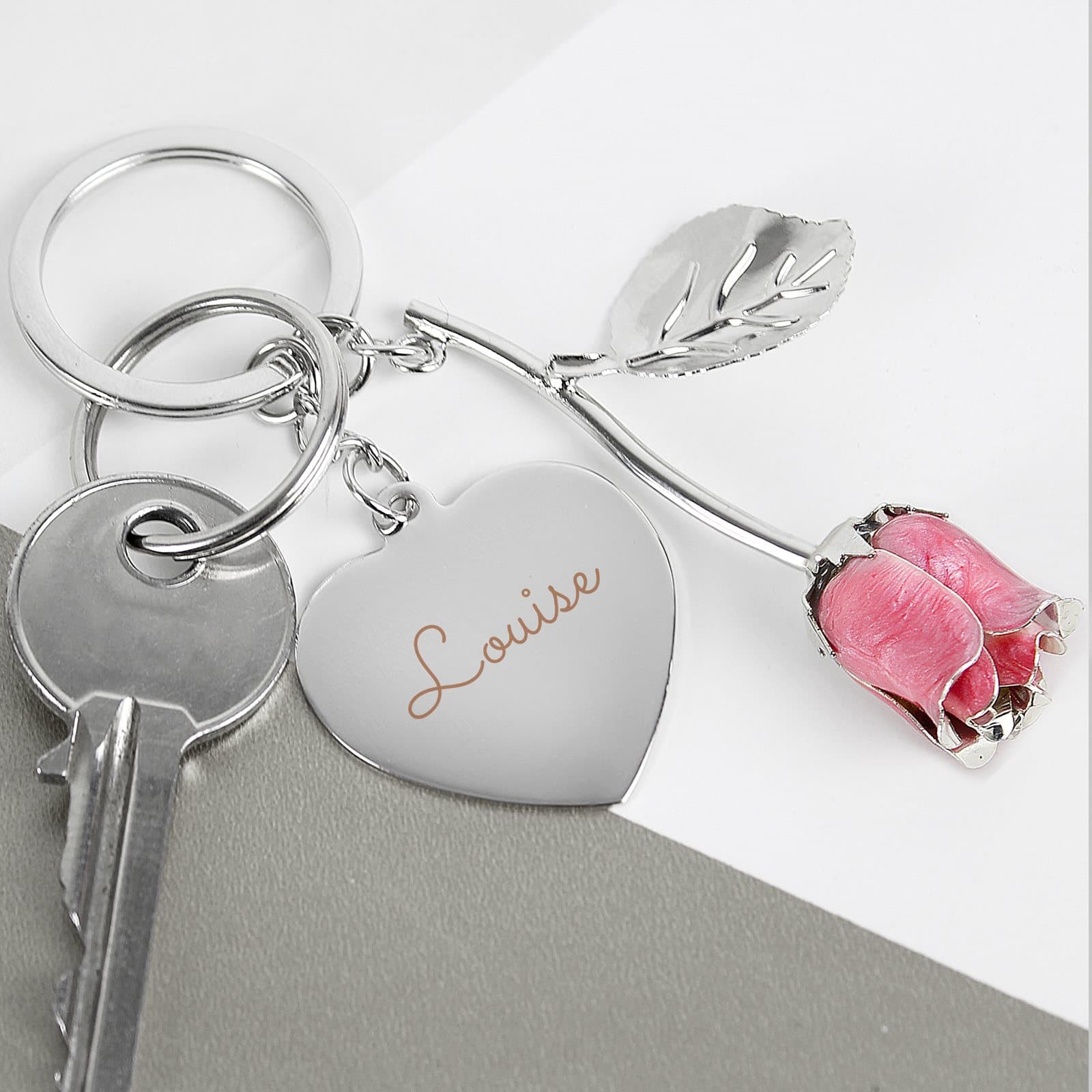 Silver plated pink rose keyring in a black box