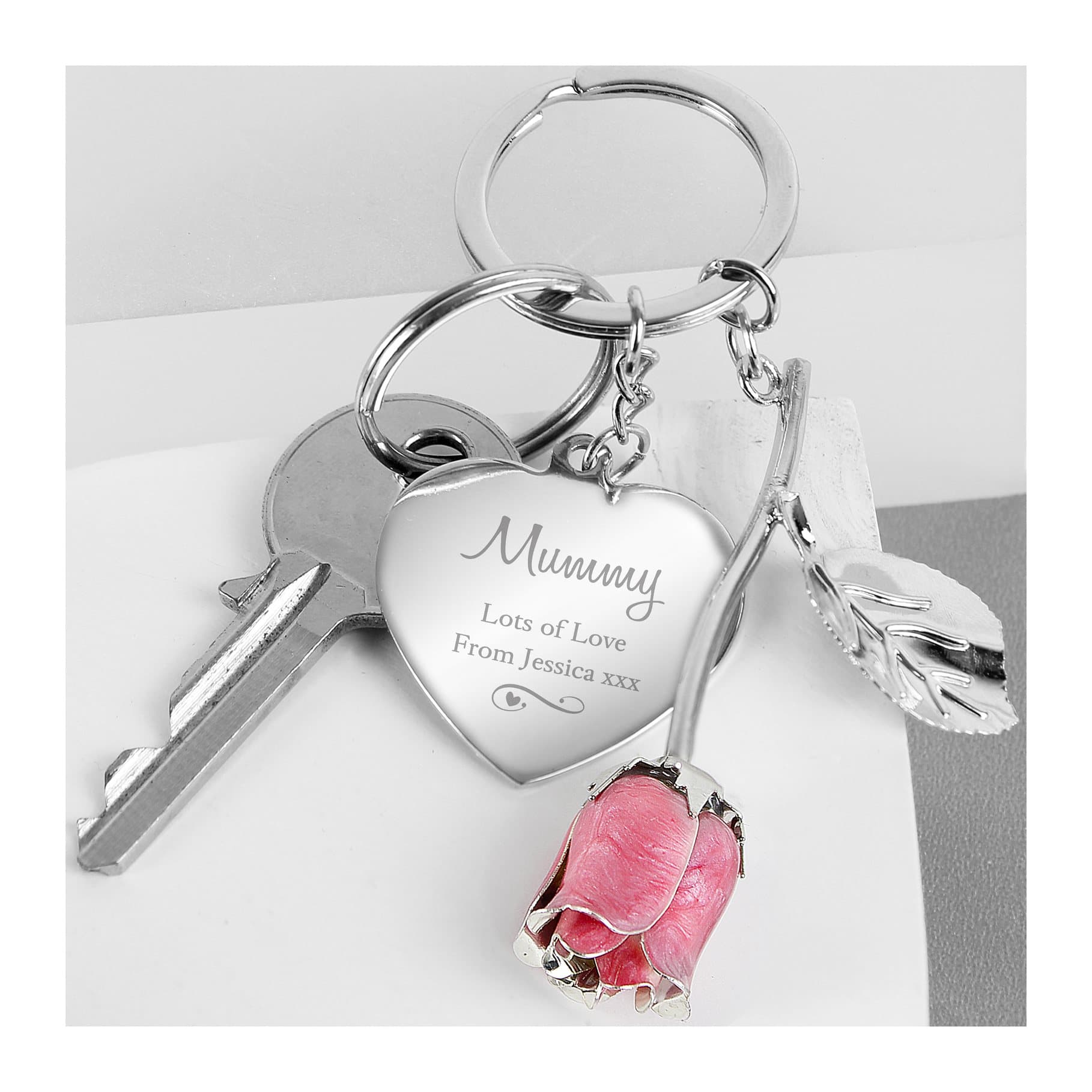 Silver plated swirls and hearts pink rose keyring