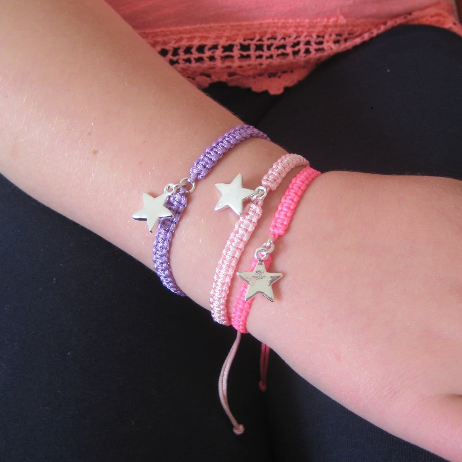 Silver star charm friendship bracelet on a braided nylon cord