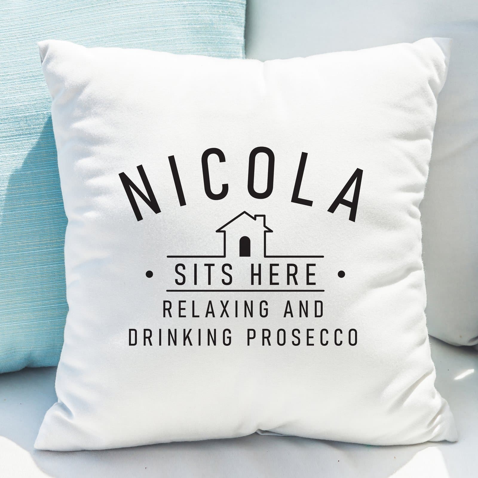 Sits Here cushion personalised with a name and message lines