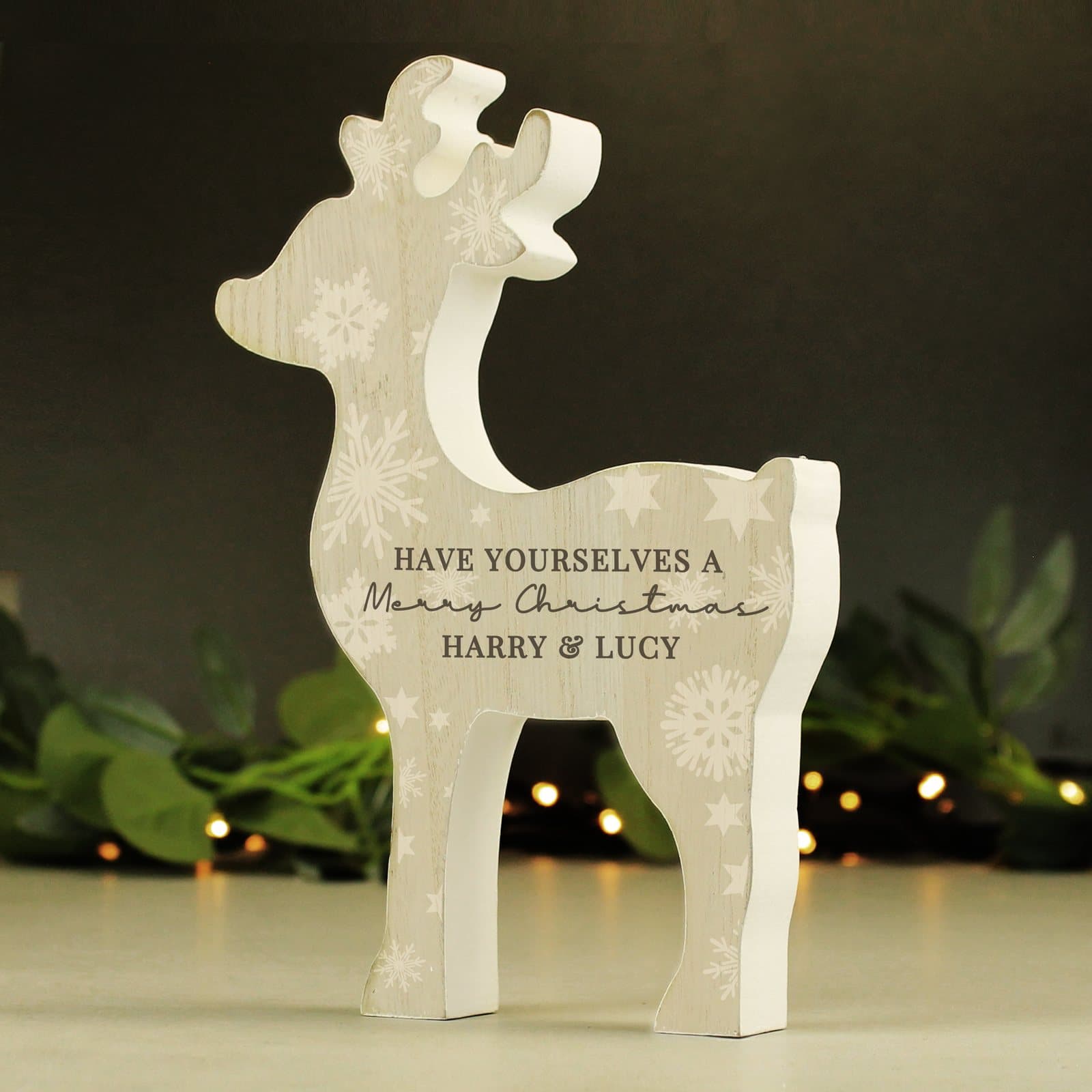 Rustic wooden reindeer ornament with three lines of personalised text