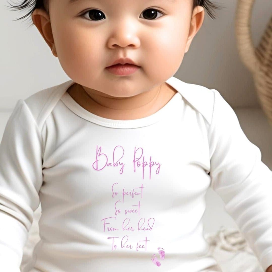 Personalised So Perfect baby outfit with a pink name and little baby footprints