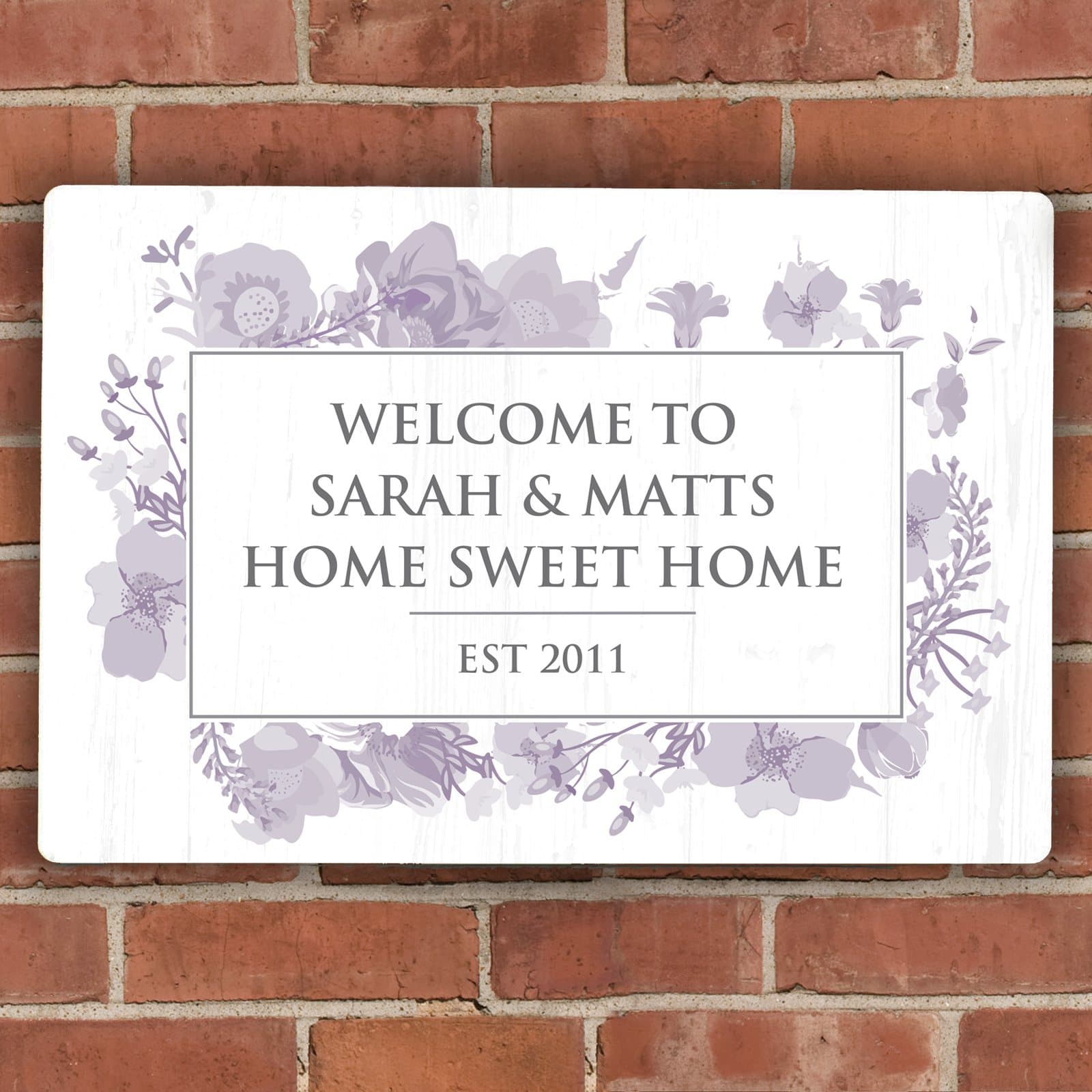 Soft watercolour metal sign with four lines of text