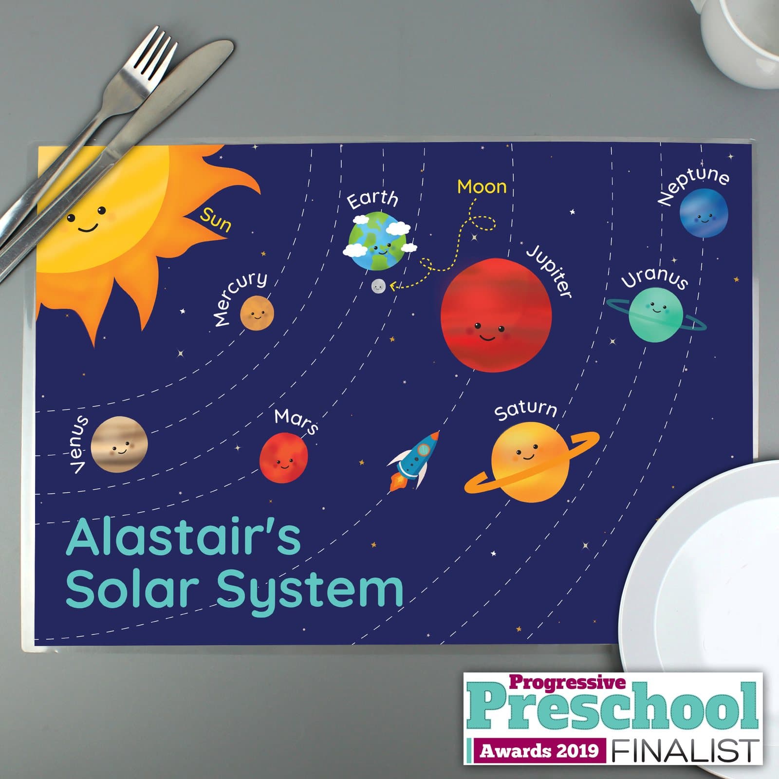 Laminated solar system placemat with a child's name and Solar System text