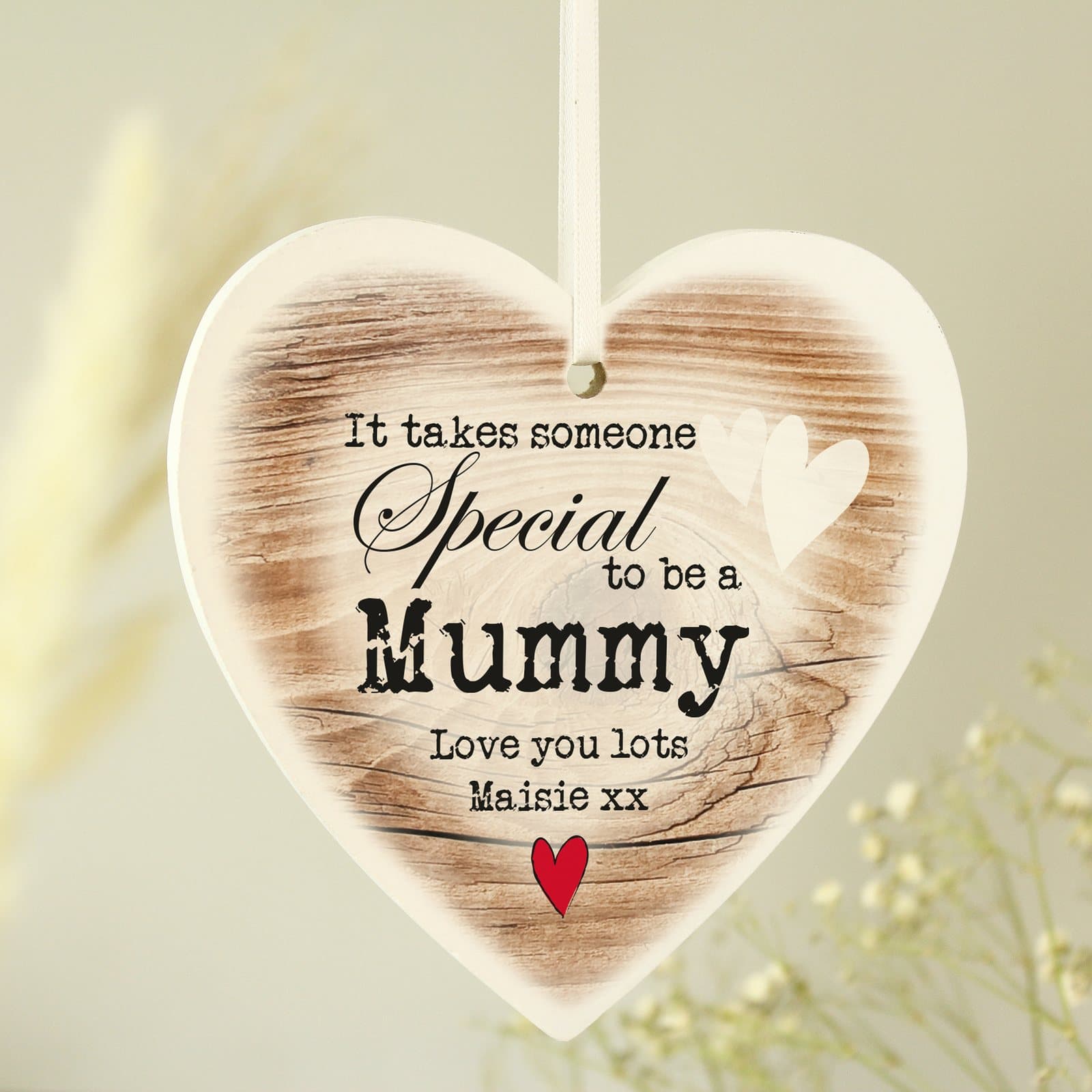 Wooden heart decoration with ribbon and someone special text