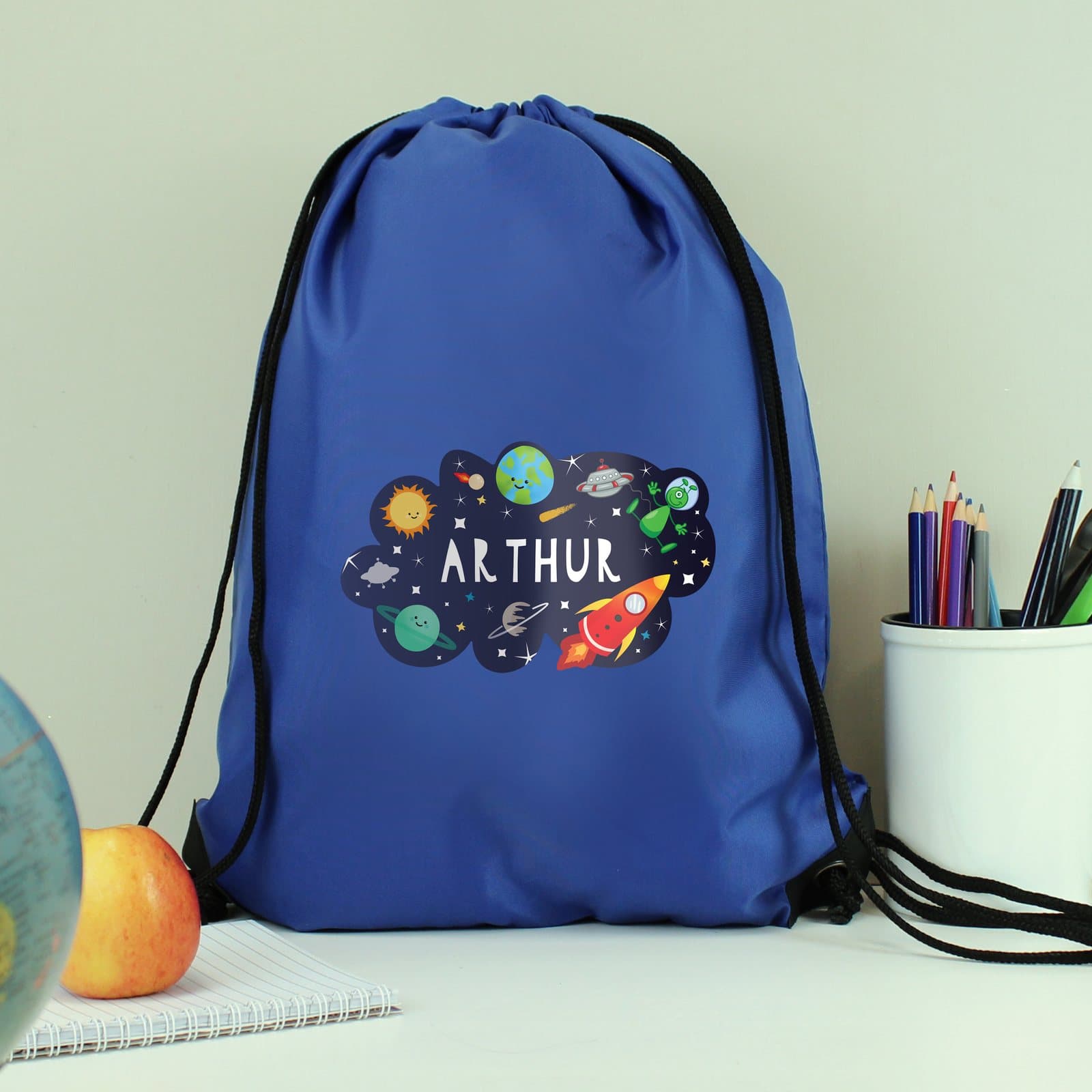 Blue space kit bag with a drawstring and a name