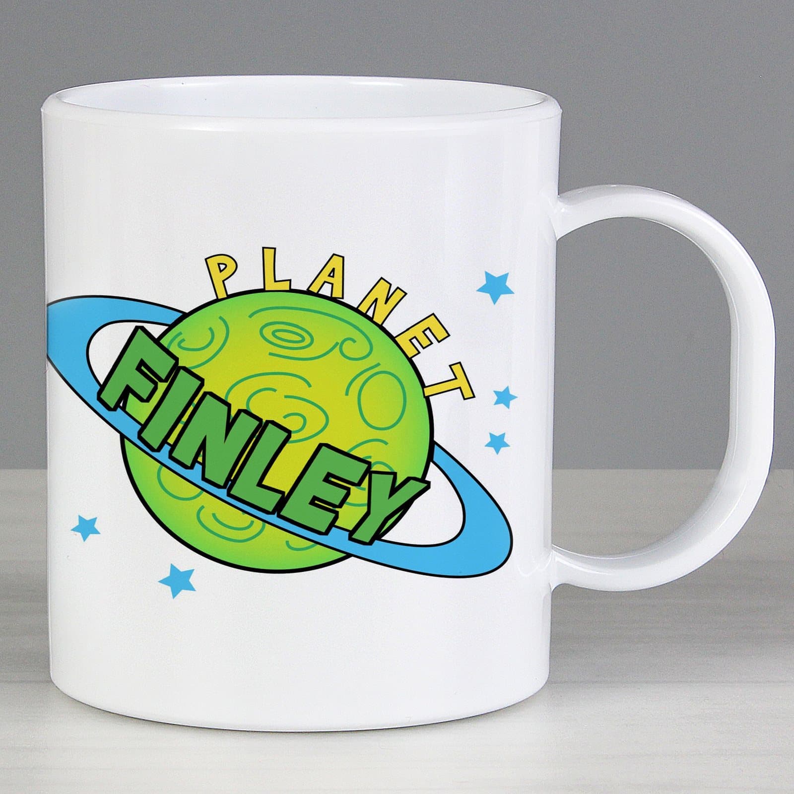 Space design plastic mug with the word Planet and a name