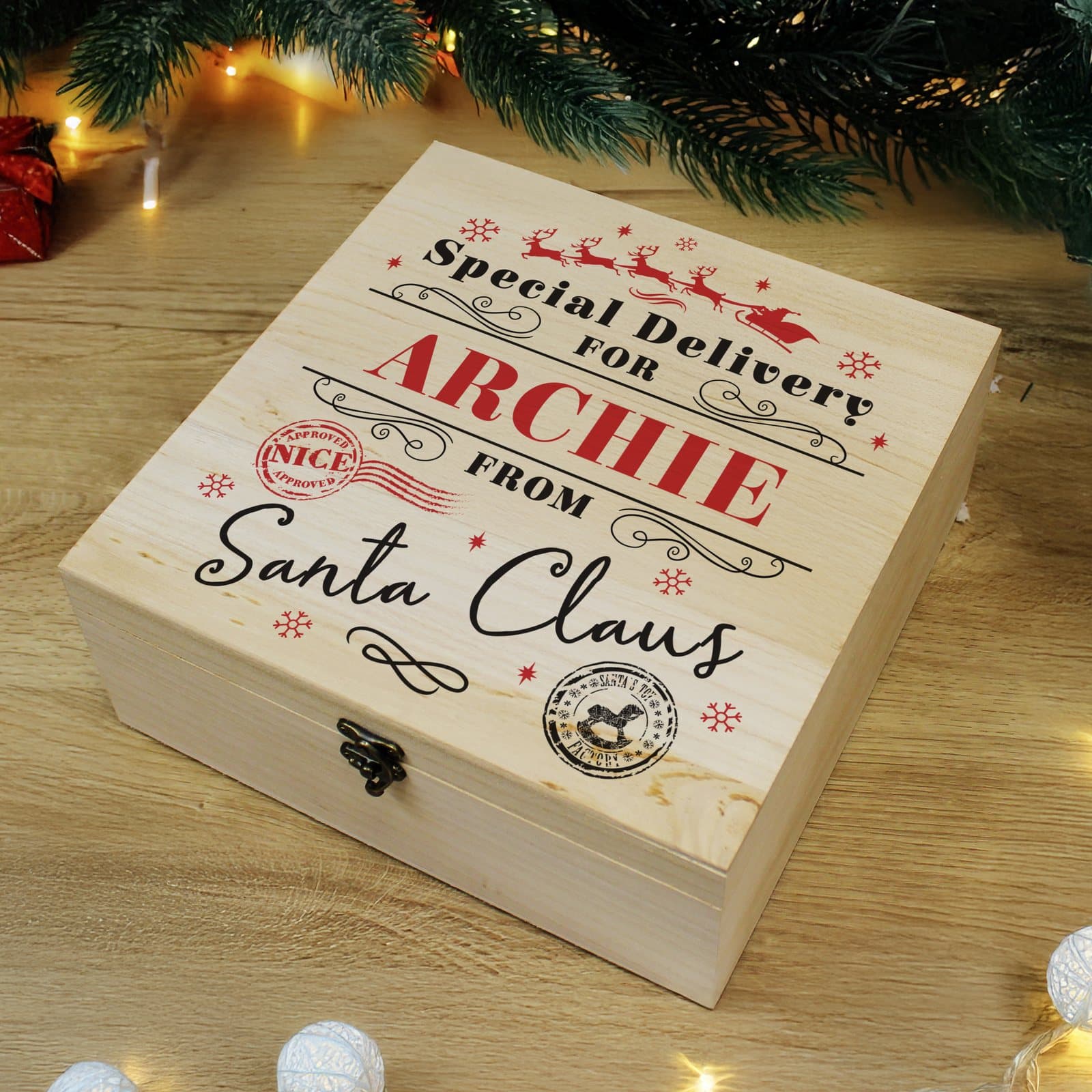 Wooden personalised Christmas Eve box with a metal clasp