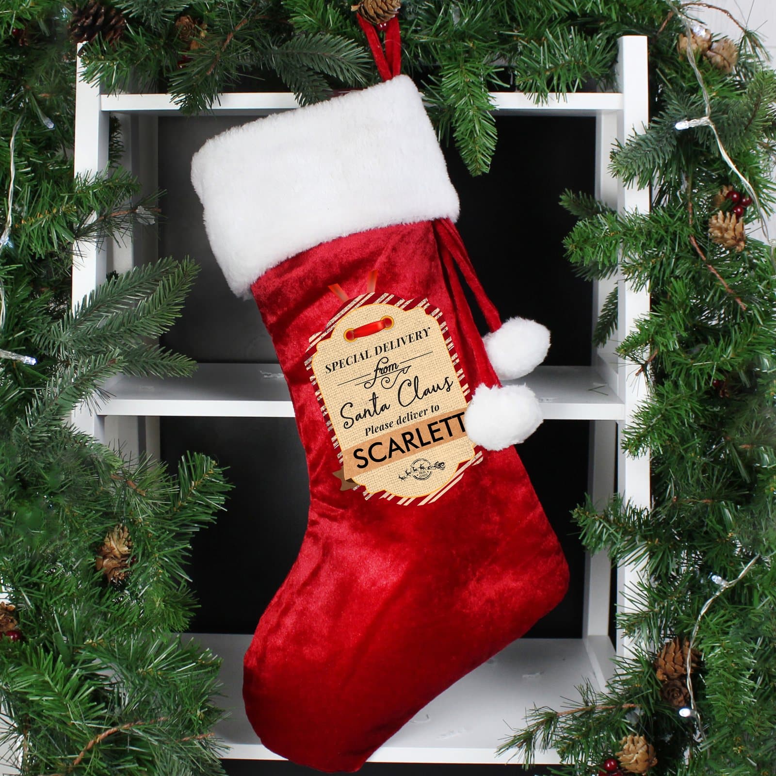 Red 'special delivery' Christmas stocking with Santa Claus wording