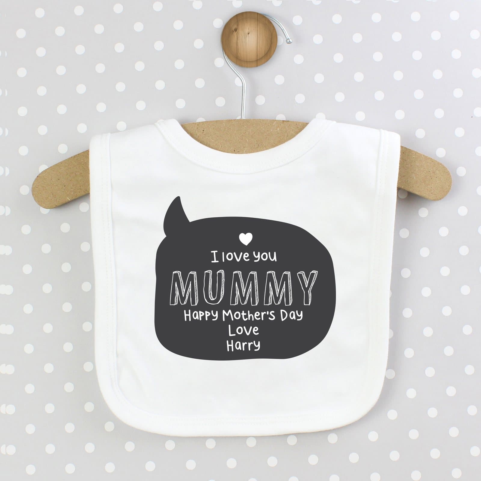 Baby bib with a speech bubble and five lines of personalised text