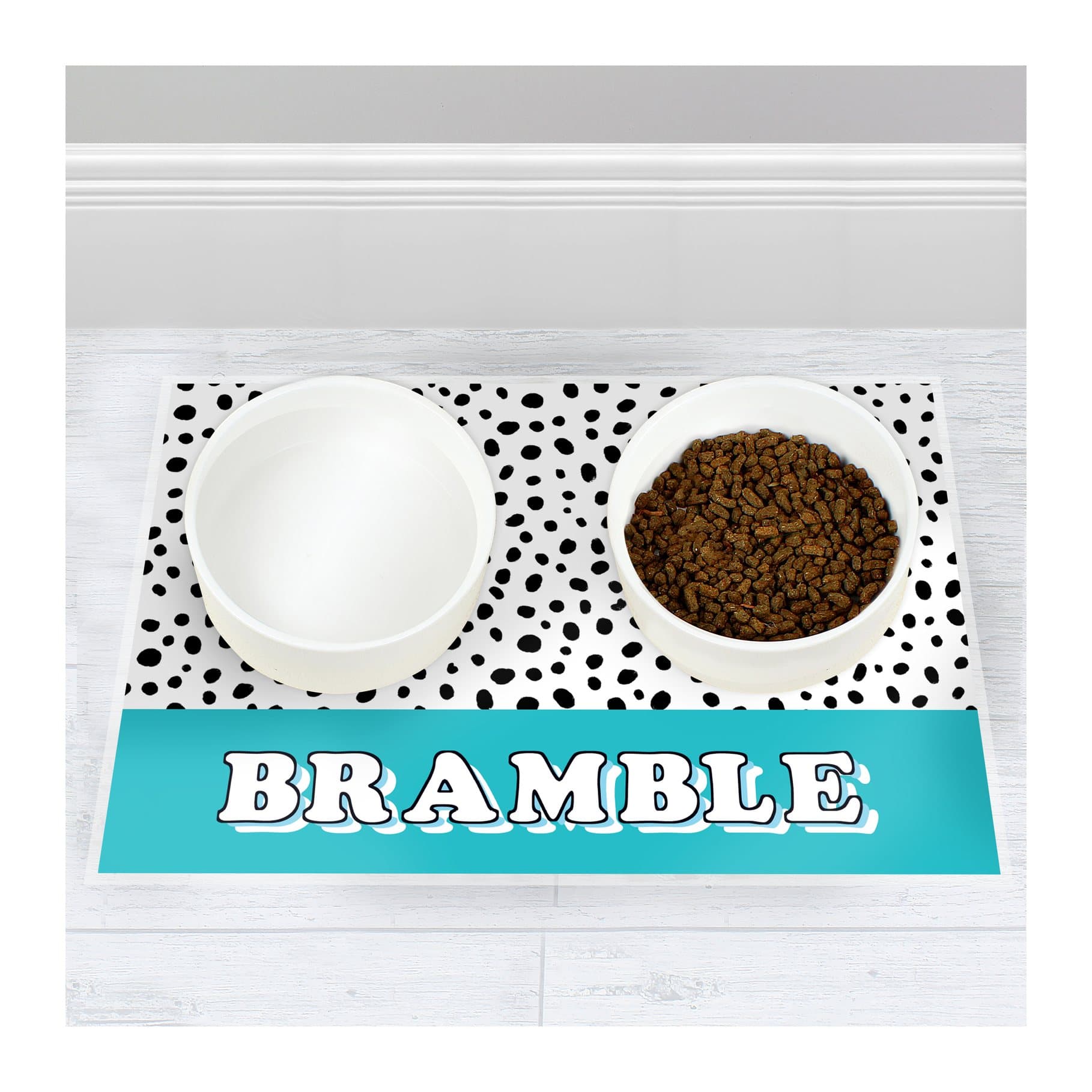 Spotty pet bowl mat personalised with a pet's name in blue or pink