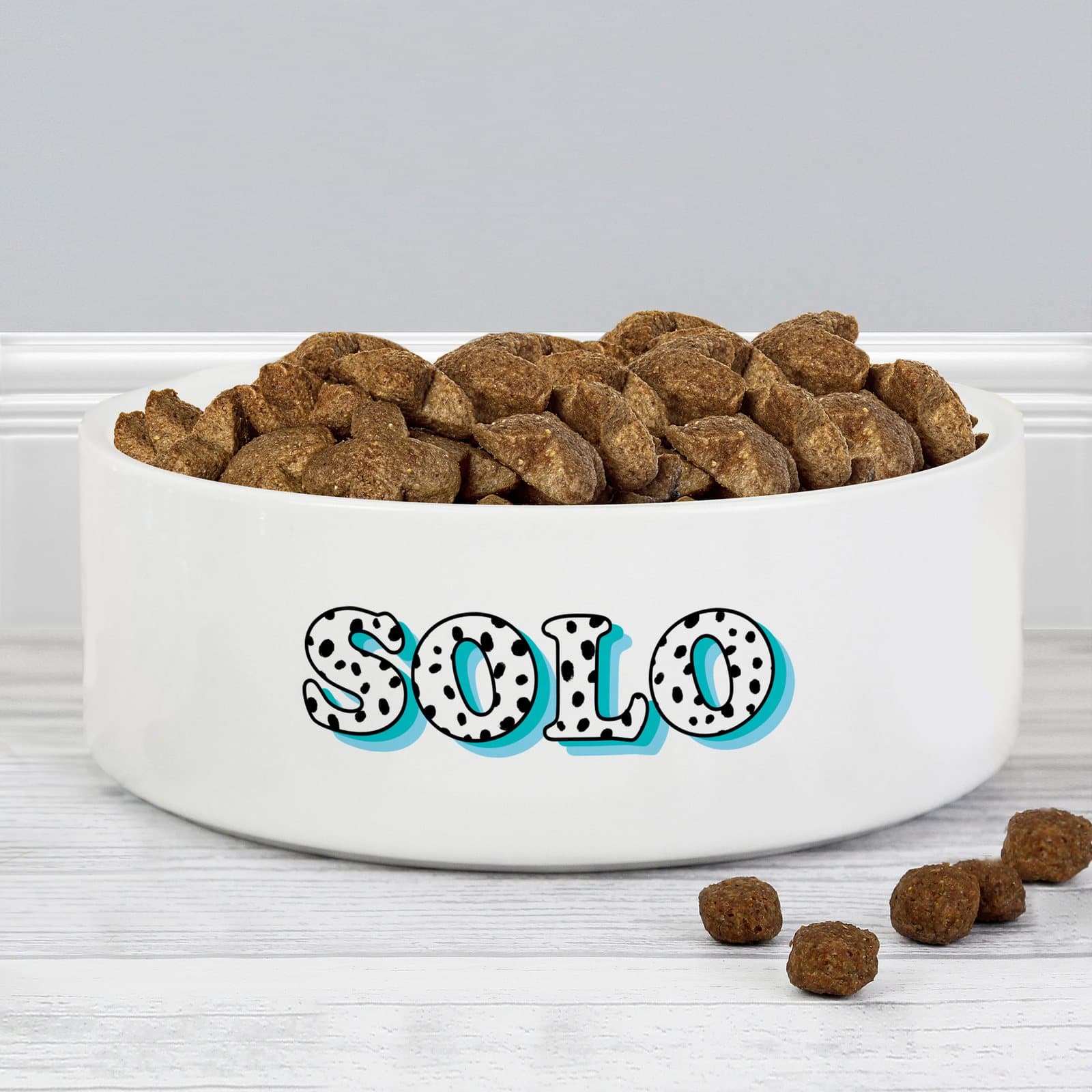 Ceramic pet bowl with spots and a pet's name