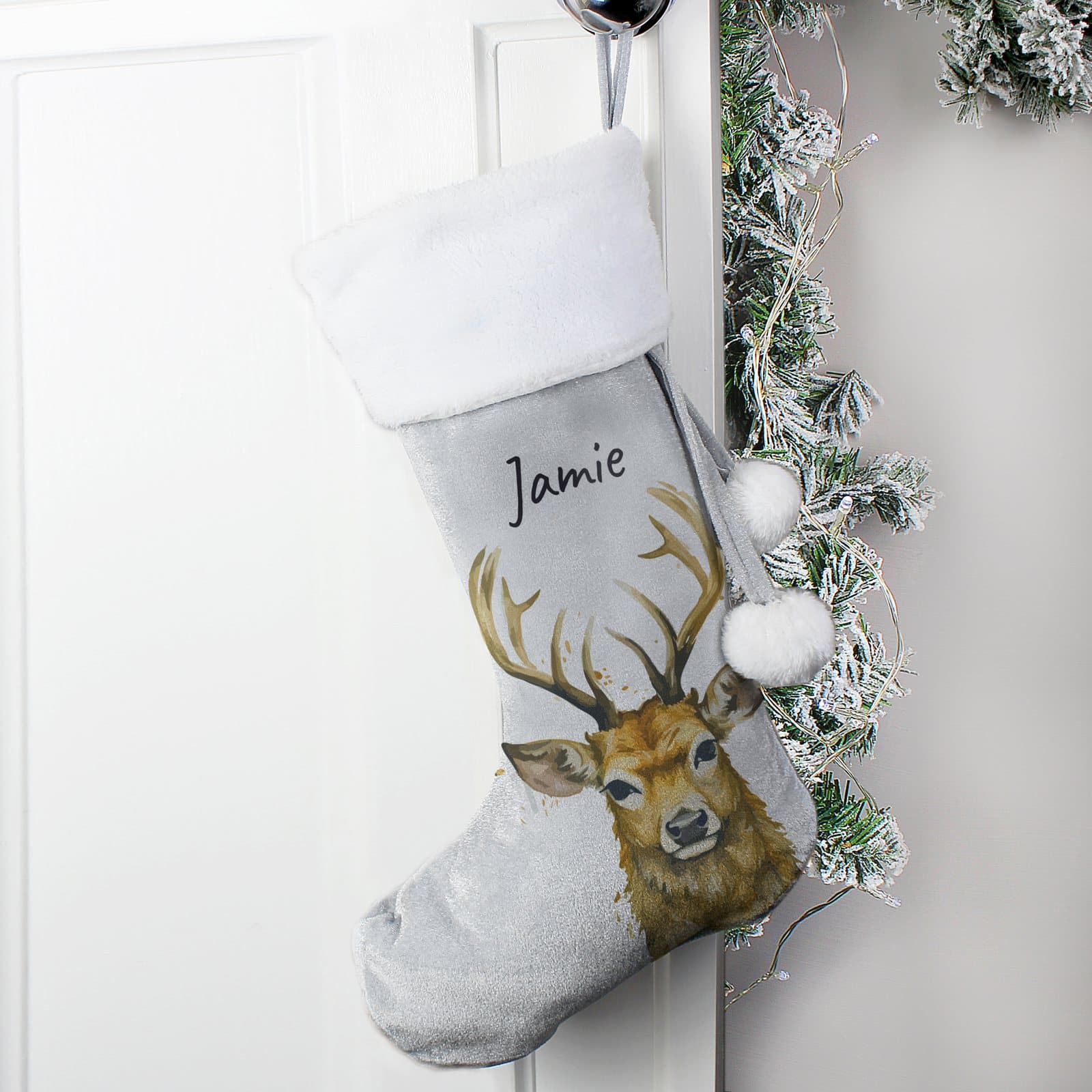 Velvet stag Christmas stocking with a plush white cuff