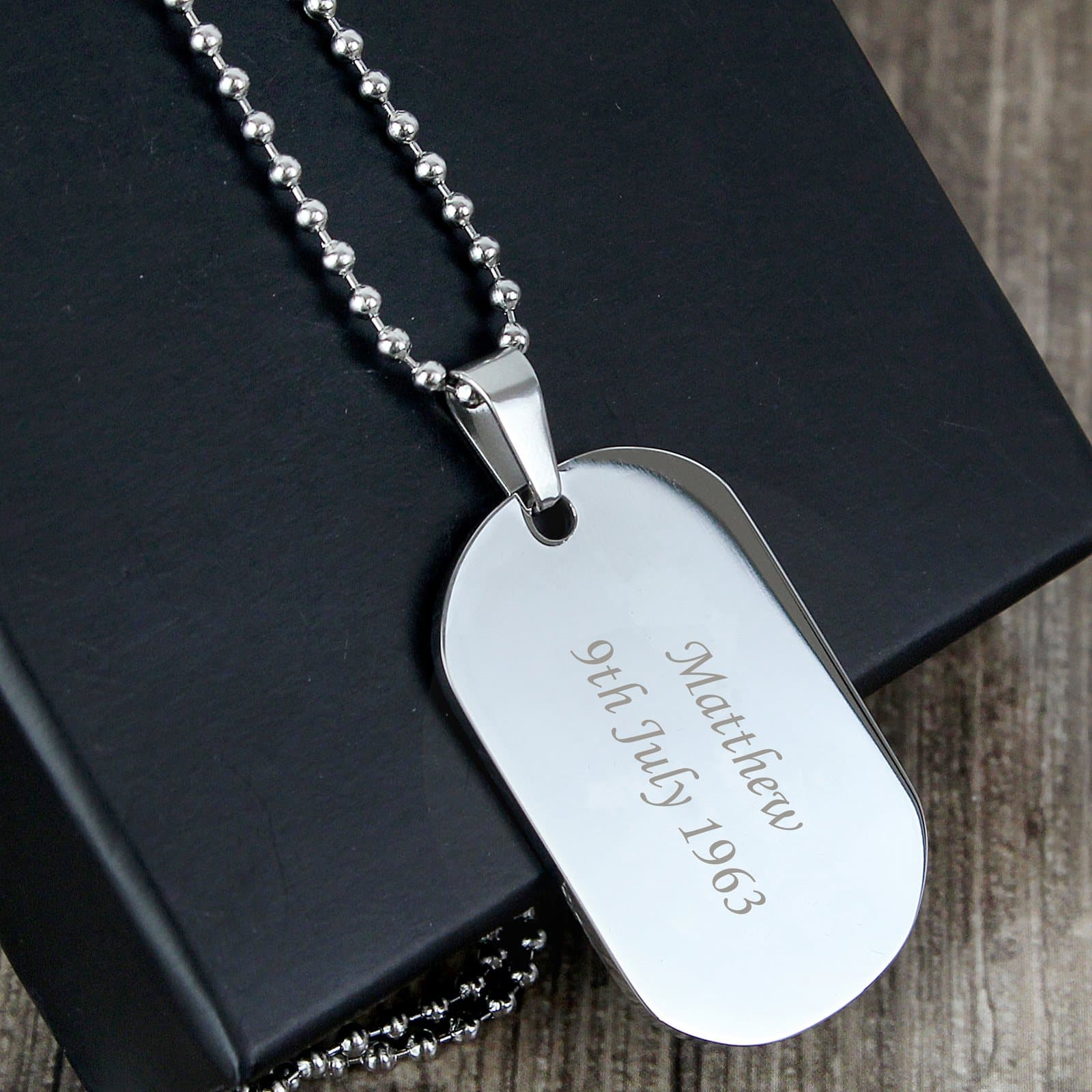 Stainless steel dog tag necklace on a chain