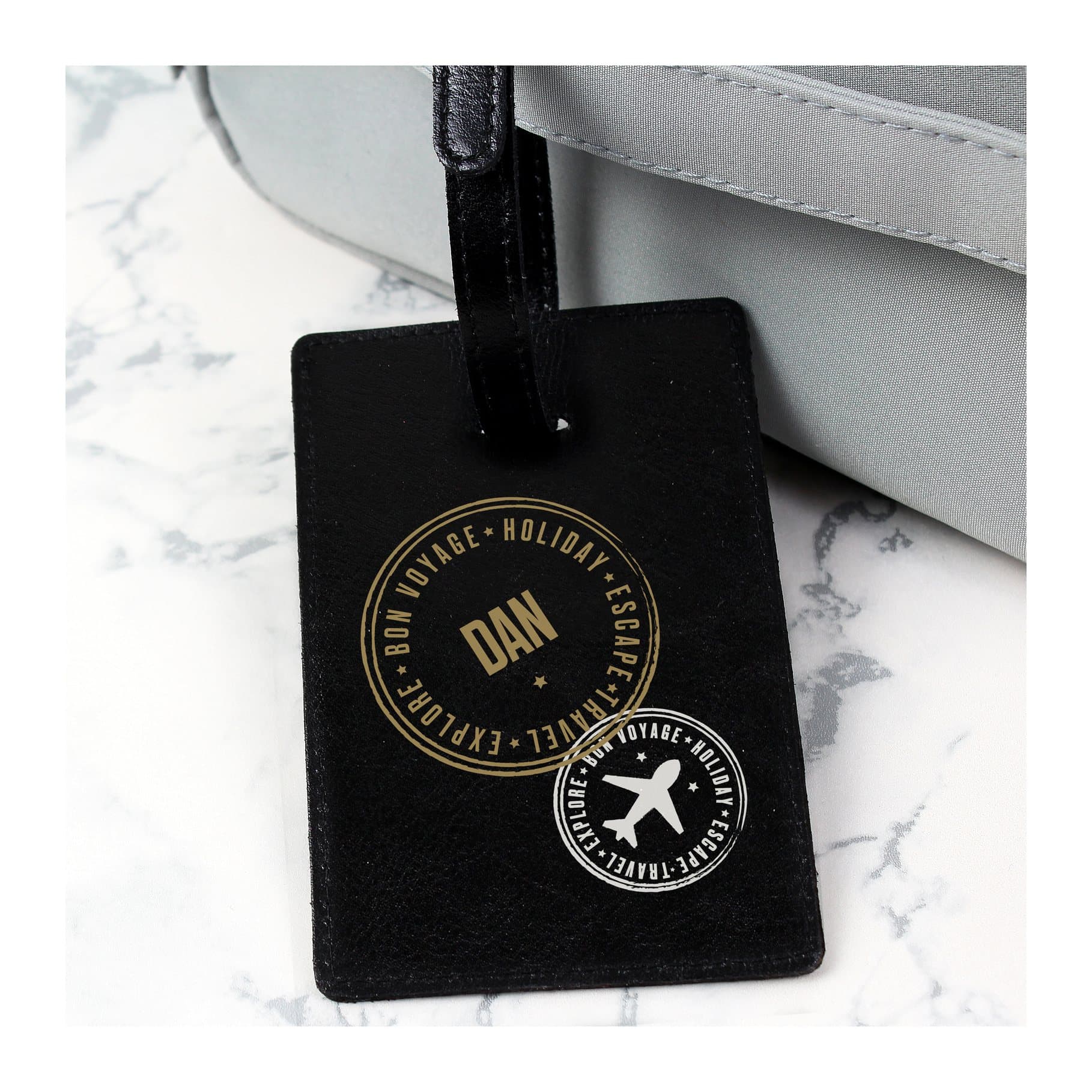 Personalised black leather luggage tag with a buckle